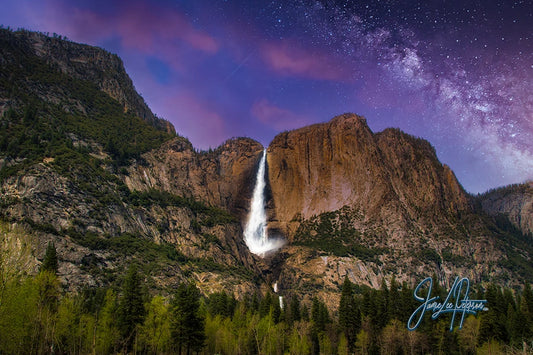 Starry night over Yosemite Falls, where nature's majesty meets the cosmos, adding wonder to walls