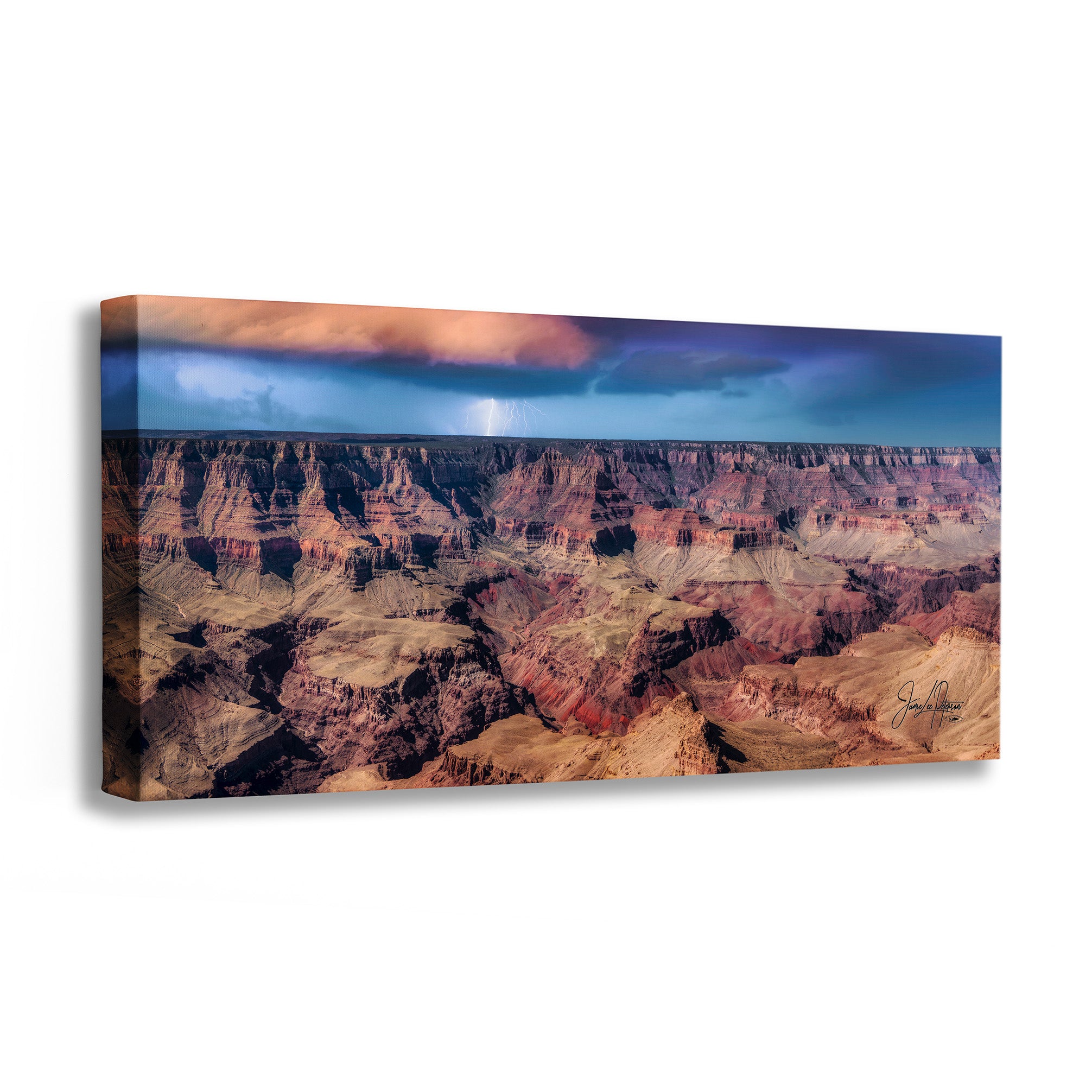 A panoramic canvas wall art print depicting the Grand Canyon under a stormy sky with lightning, shown as a gallery-wrapped canvas on a white background.