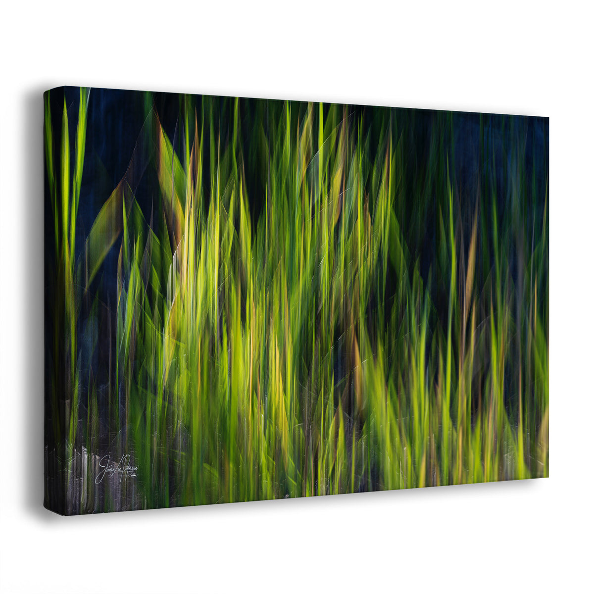 A side view of a canvas wall art print showing an abstract close-up of tall grass or reeds in bright green, yellow-green, and dark navy/black tones, photographed against a clean white background.