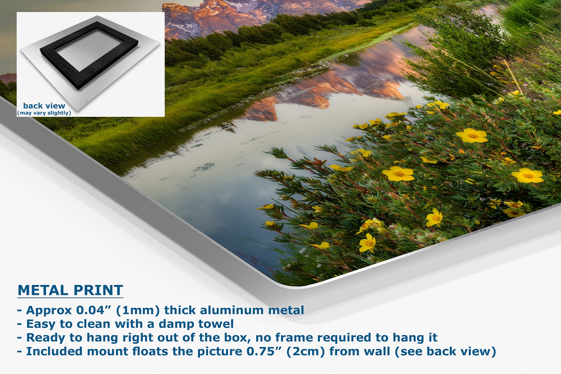 A metal wall art print showing a scenic landscape with a reflective river, green hills, mountains, and yellow flowers. The image includes a small inset showing the back view of the frame, product text describing the aluminum finish and mounting, and a clean white background.