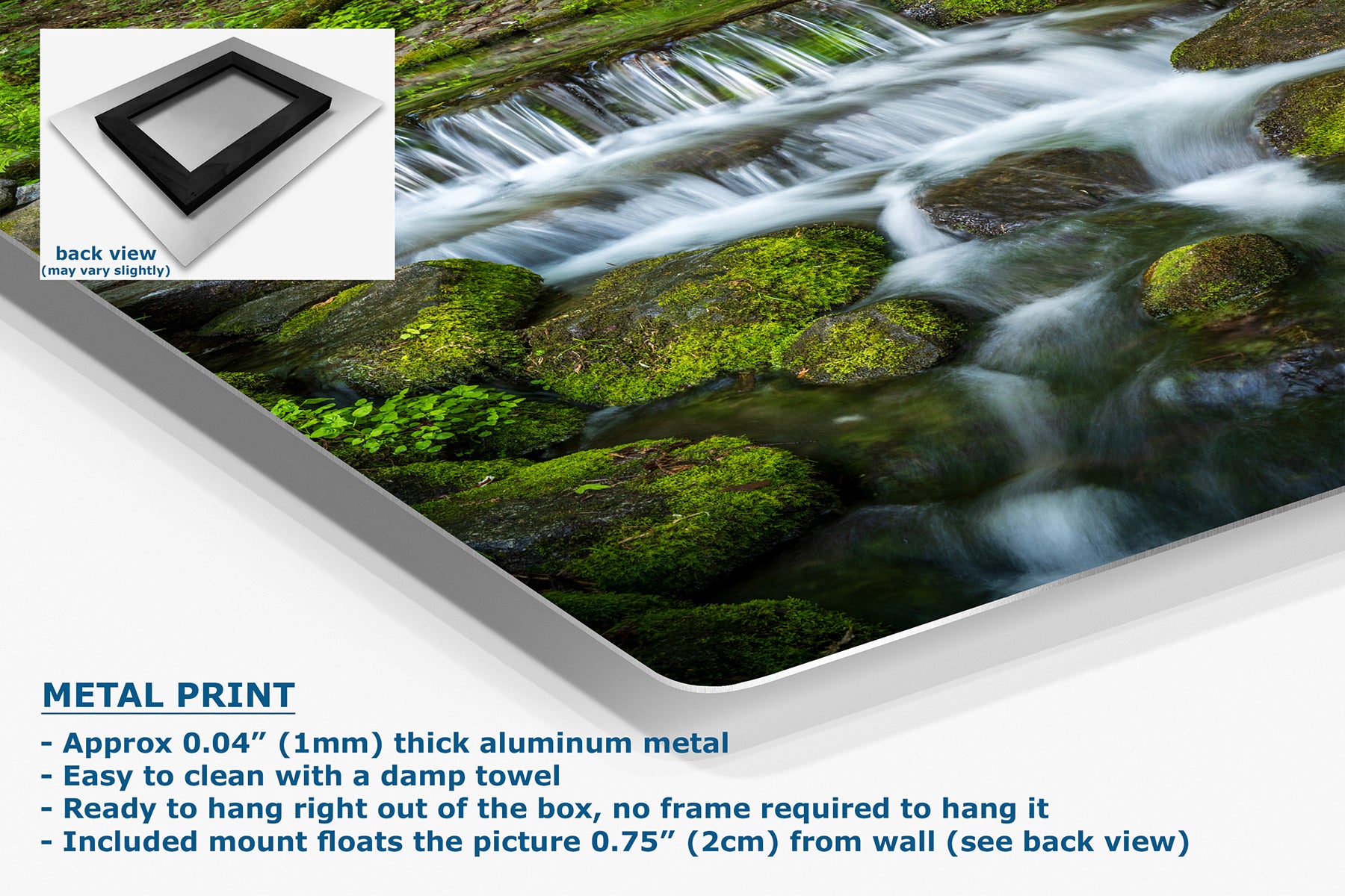 A metal wall art print showing a close-up nature scene of a flowing stream over mossy rocks, presented at an angle with product details and text on a white background. An inset shows the back view with a black frame.