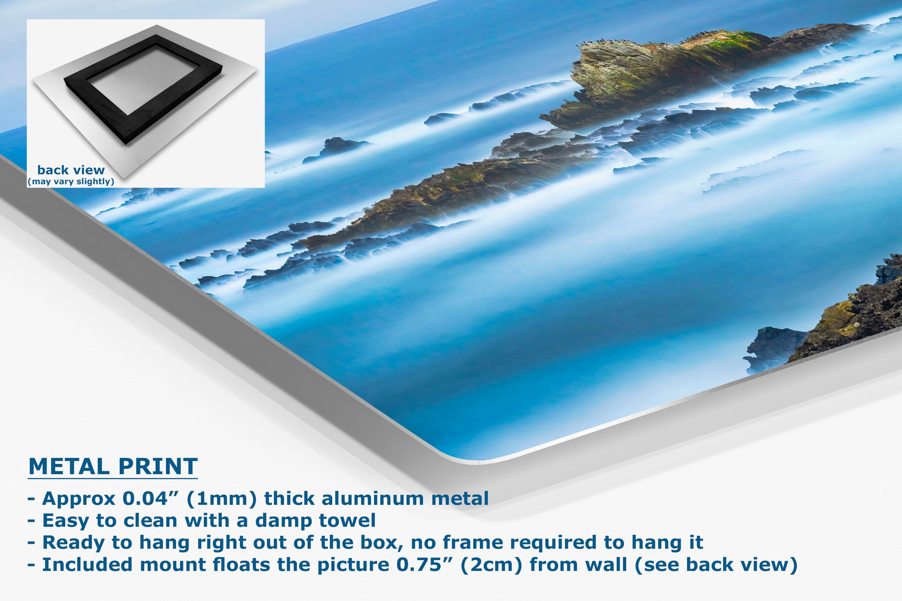 A metal print poster of a coastal ocean scene with rocky cliffs and blue water, shown at an angle with a small inset back view and product text describing the aluminum print and hanging instructions.