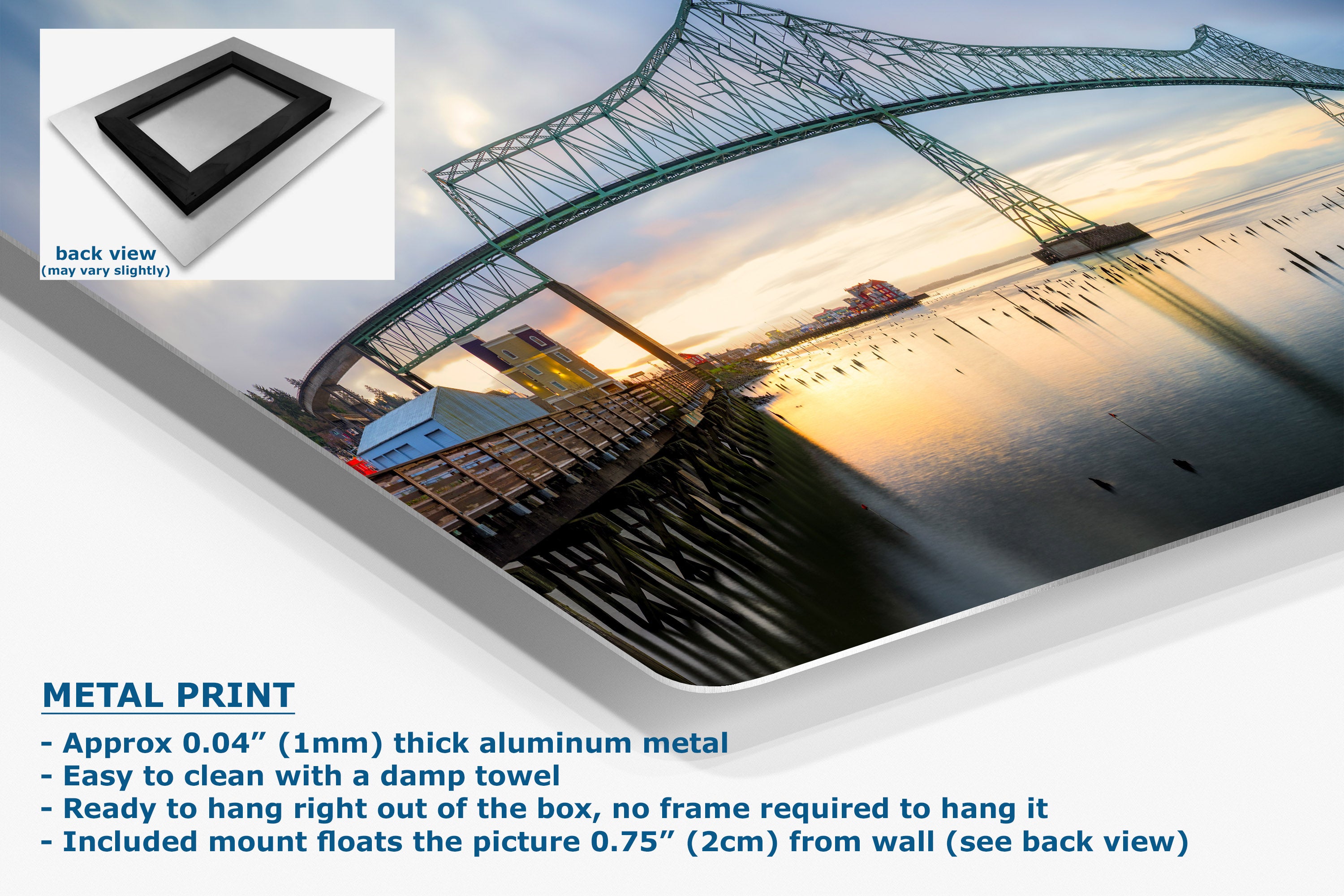 A metal wall art print mockup showing a large bridge over water at sunset, with text describing the product as a 0.04" (1mm) thick aluminum metal print and a small inset showing the back view.