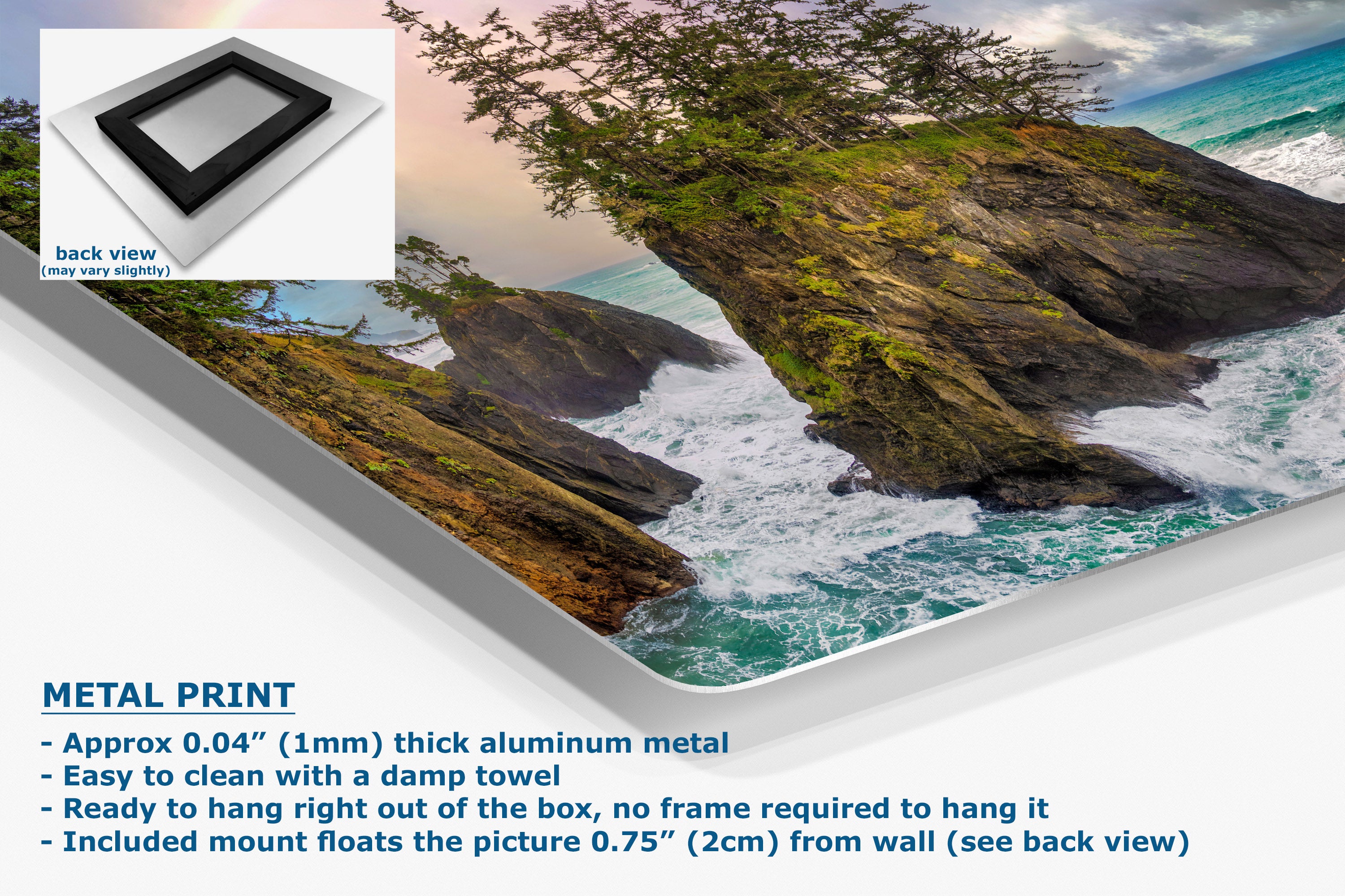 A metal wall art print showing a coastal rocky shoreline with turquoise ocean water and green trees, presented at an angle with a small inset back-view swatch and marketing text about aluminum finish and mounting.