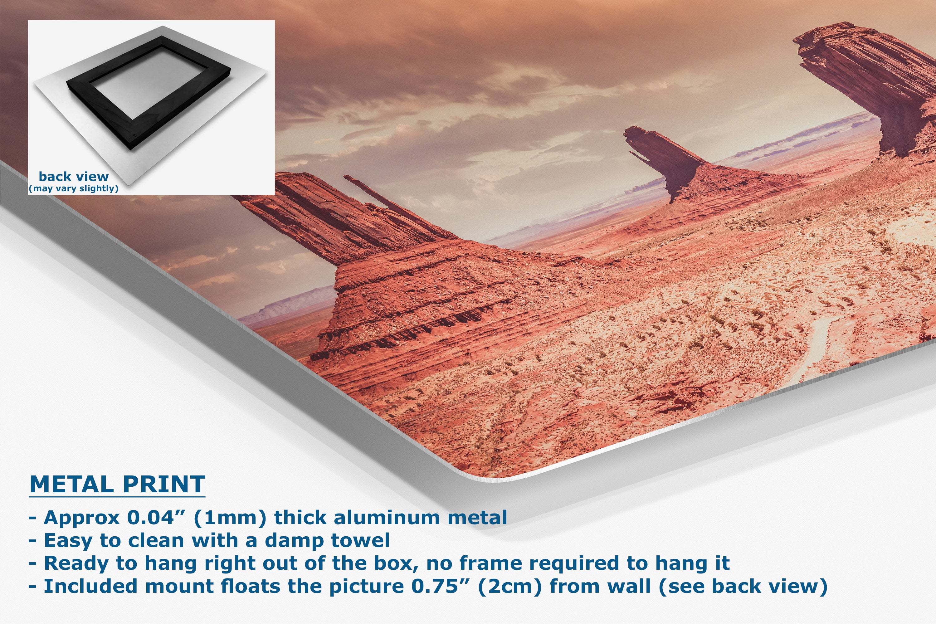 A metal wall art print preview showing a desert canyon landscape with large rock formations under a warm sky. The image includes a small back-view inset of a black frame, product text reading 'METAL PRINT,' and a tilted canvas mockup with a white wall background.