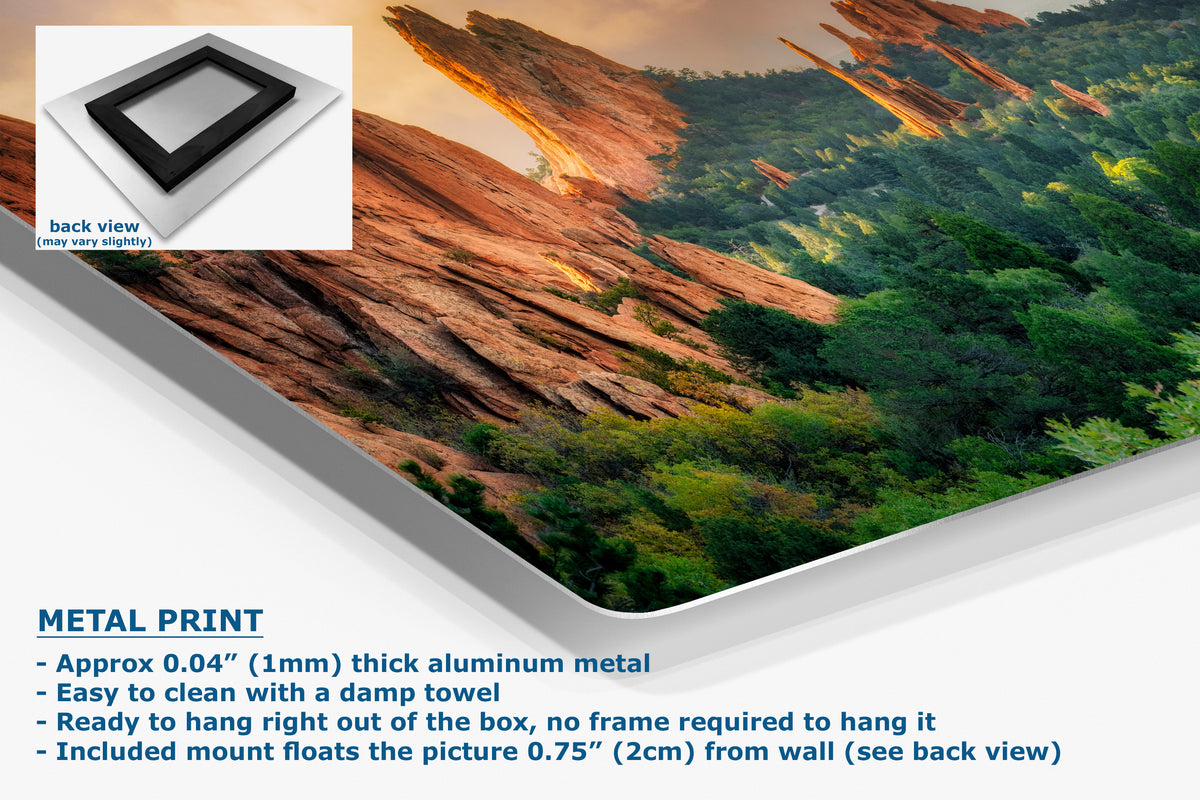A corner view of an aluminum metal print panel featuring a scenic landscape of red rock cliffs and green forest, shown at an angle with a small inset back-view image and product text describing its aluminum finish and mounting details.