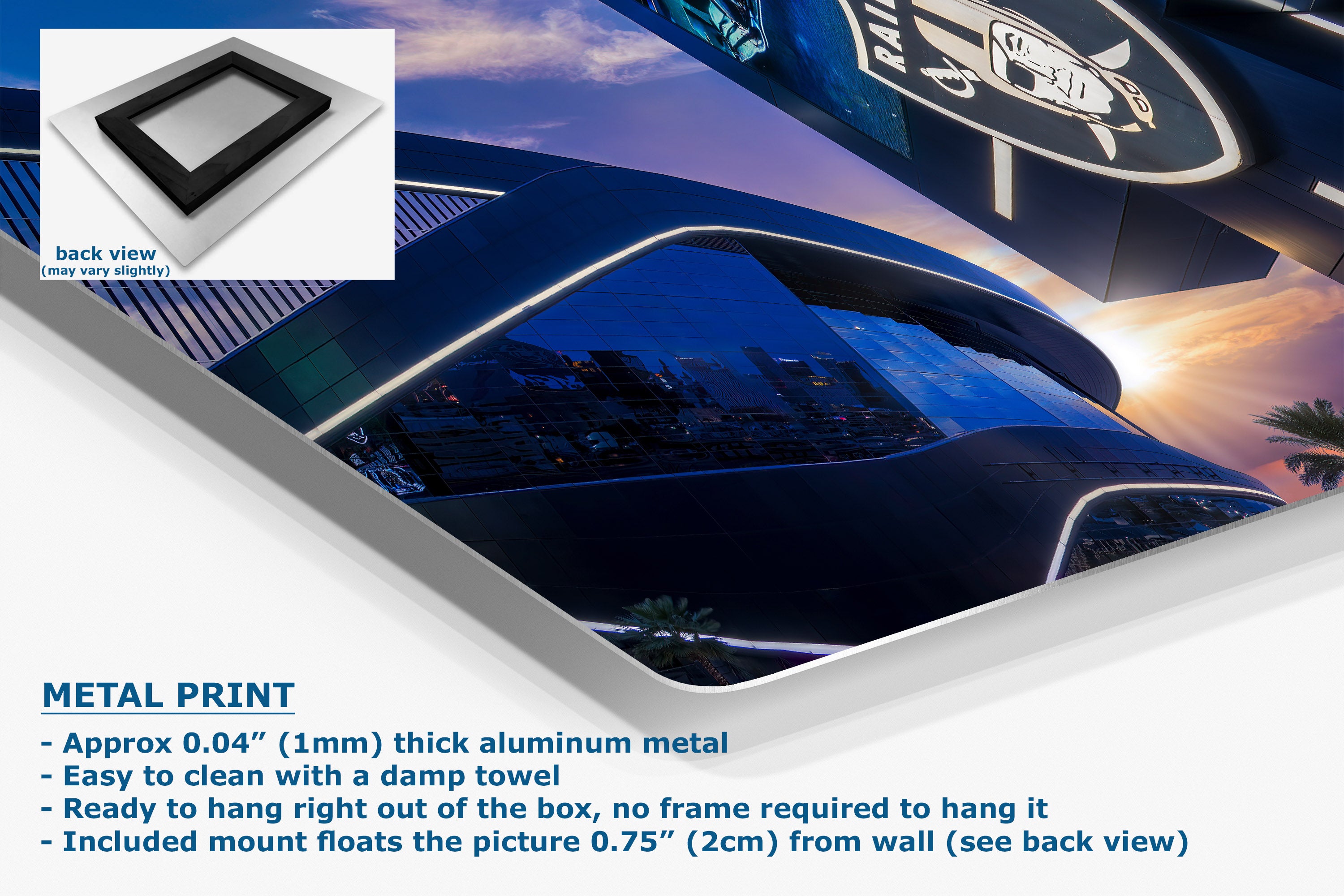 A corner view of an aluminum metal wall art print featuring a dramatic sunset city skyline reflection, shown at an angle with product details and text on a white background. An inset shows the back view of the frameless print.
