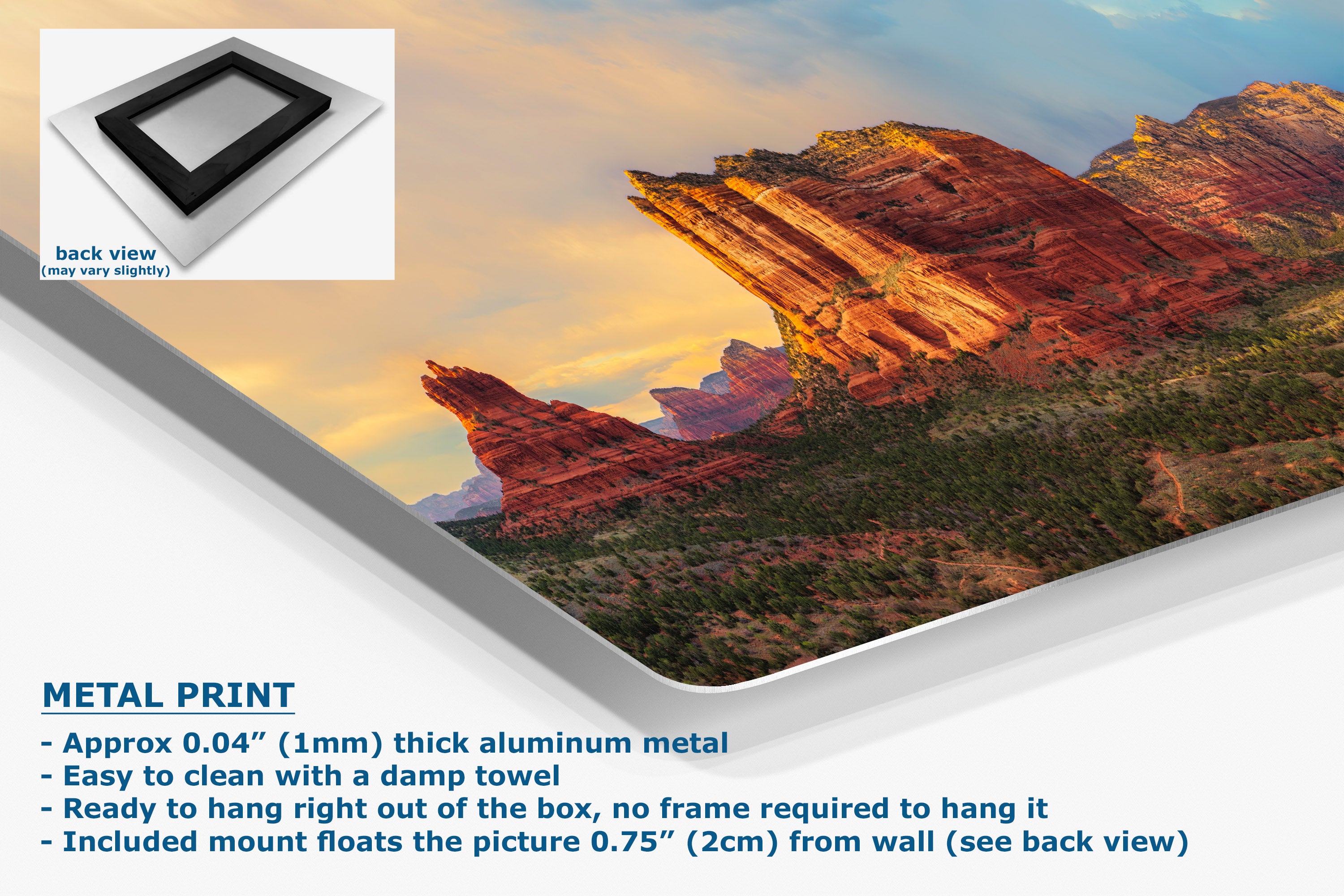 A large aluminum metal wall art print showing a desert canyon landscape at sunset, with a small inset back view of the frameless print and text describing the product features.