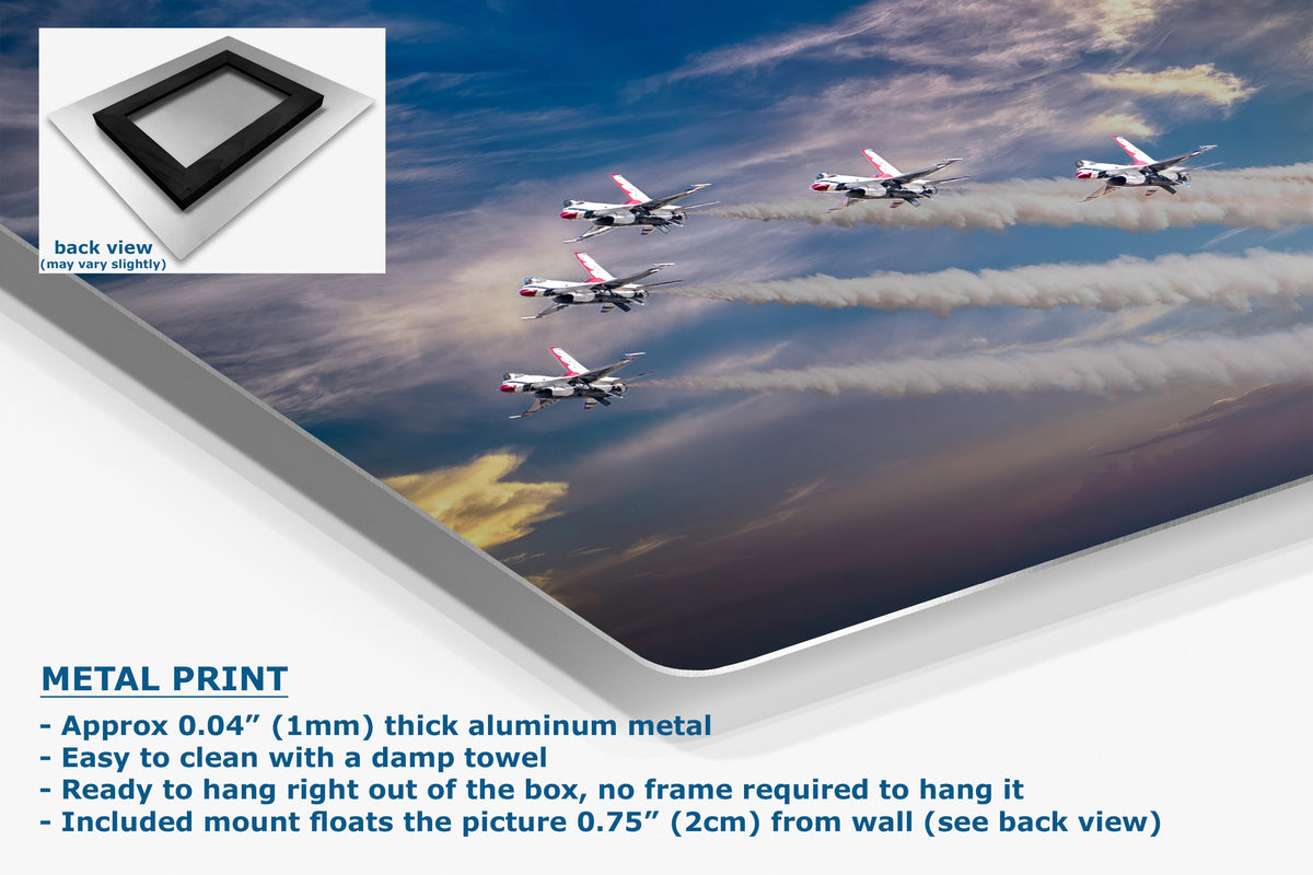 A corner view of a large wall art print showing an aerial photograph of five fighter jets flying across a blue sky with white contrails, presented at an angle with a white border and a small back-view inset.