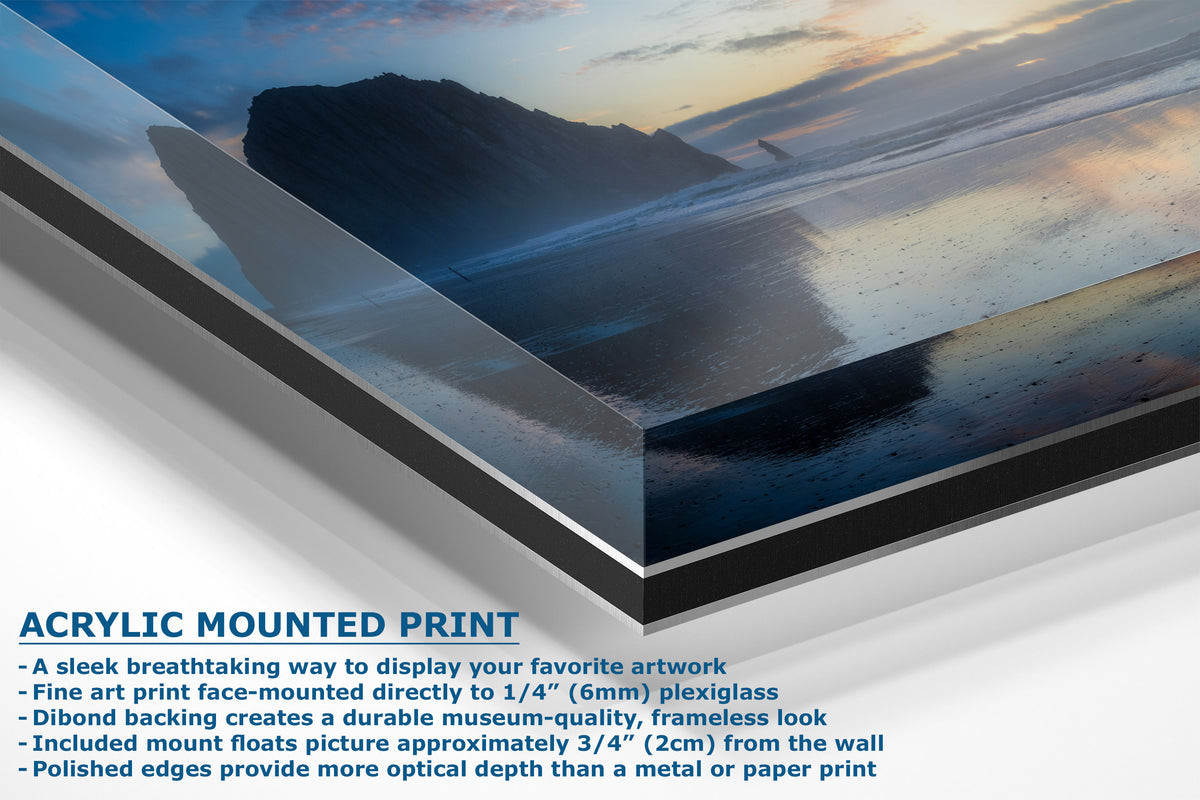 Acrylic mounted art print of a coastal landscape with a dark cliff and ocean at sunset, shown at an angle with product text details on a white background.
