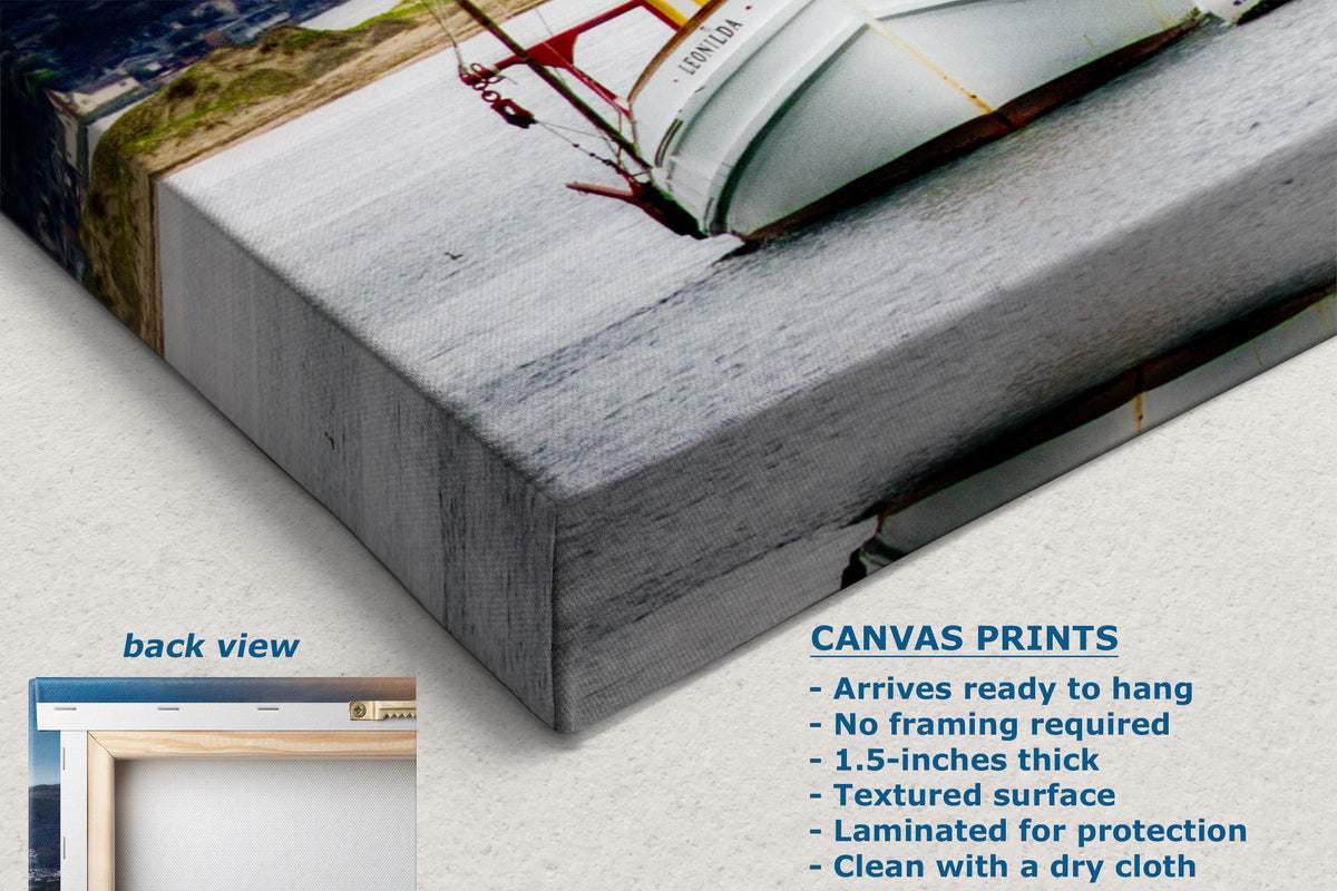 Canvas wall art print shown at an angle with a textured gray surface and a partial sailboat scene. Text on the image includes 'back view' and product details for canvas prints, on a light neutral background.