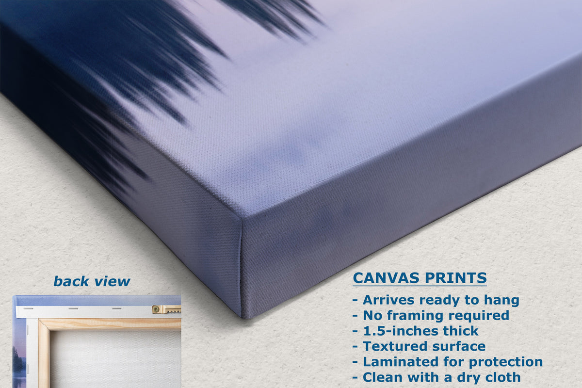 A close-up of a canvas print showing the front and side of the wrapped canvas with a blue and purple abstract design. Text on the image describes the canvas print features, and a small inset shows the back view with a wooden hanger.