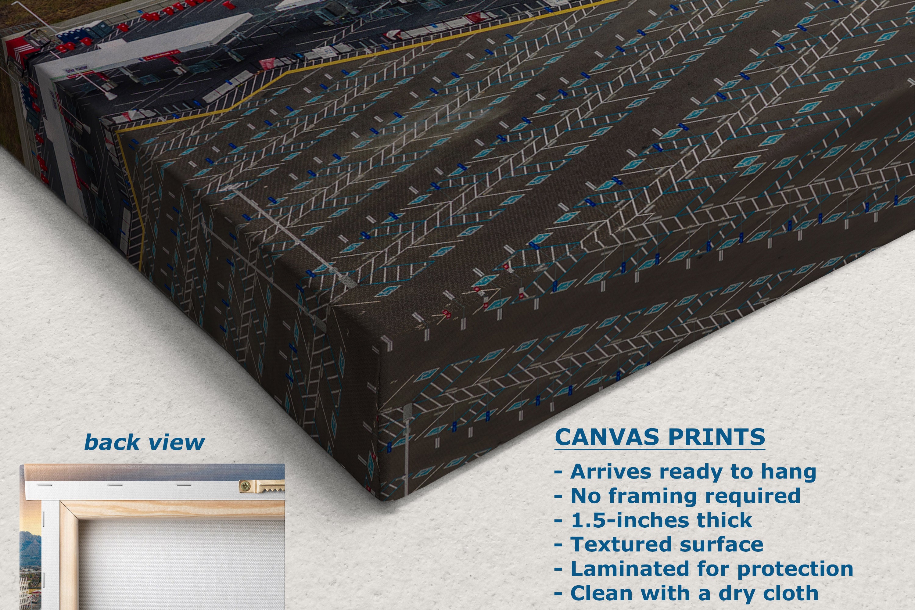A corner view of a canvas wall hanging or panel shown at an angle on a light neutral background, with a small inset labeled 'back view' and text reading 'CANVAS PRINTS' listing features. The product has a dark brown base with repeating geometric line patterns in gray, white, and small blue accents.