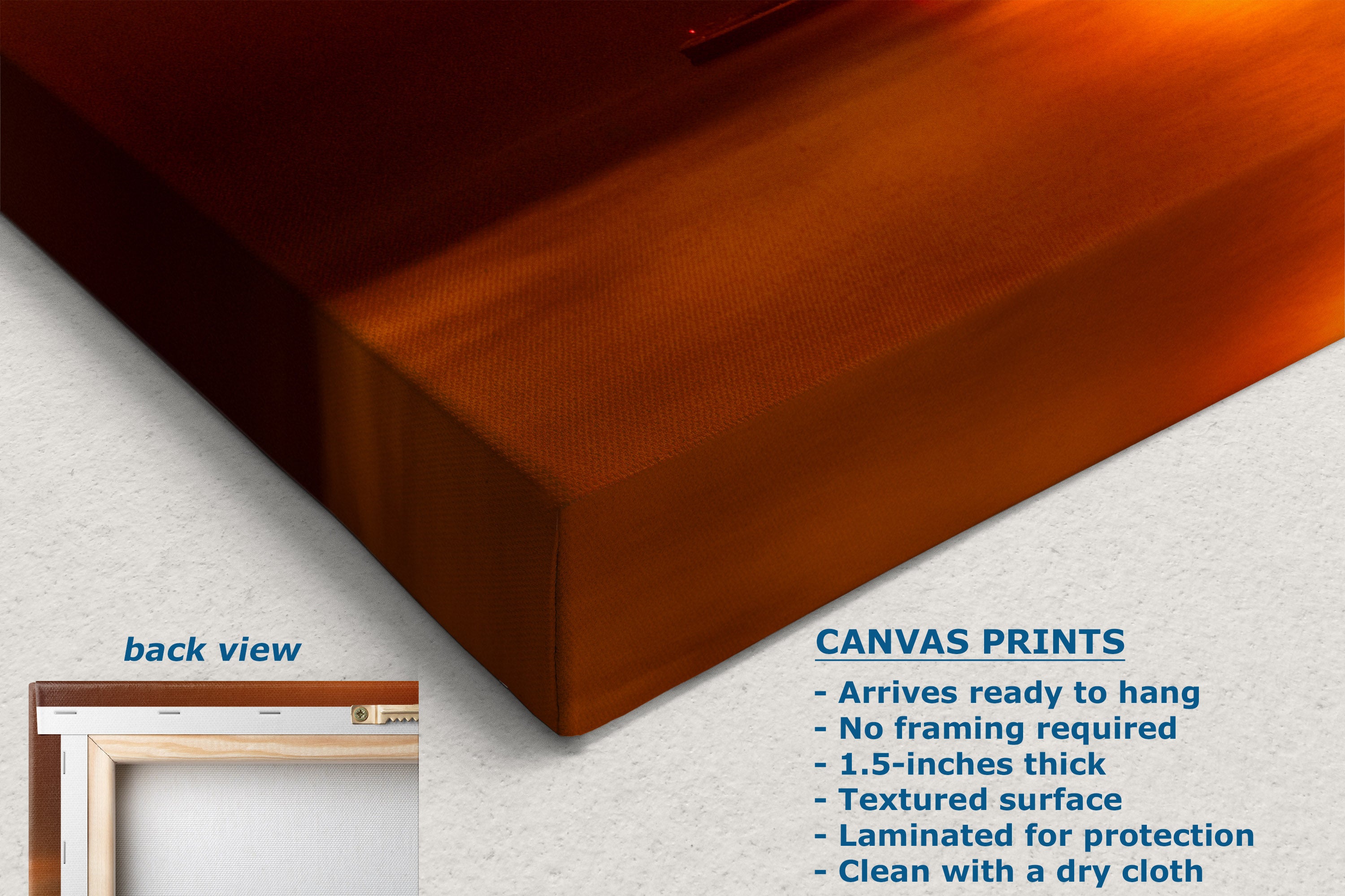 A close-up of a canvas-wrapped bed corner in a warm brown-orange tone, with text noting canvas prints are 1.5 inches thick, textured, and arrive ready to hang.