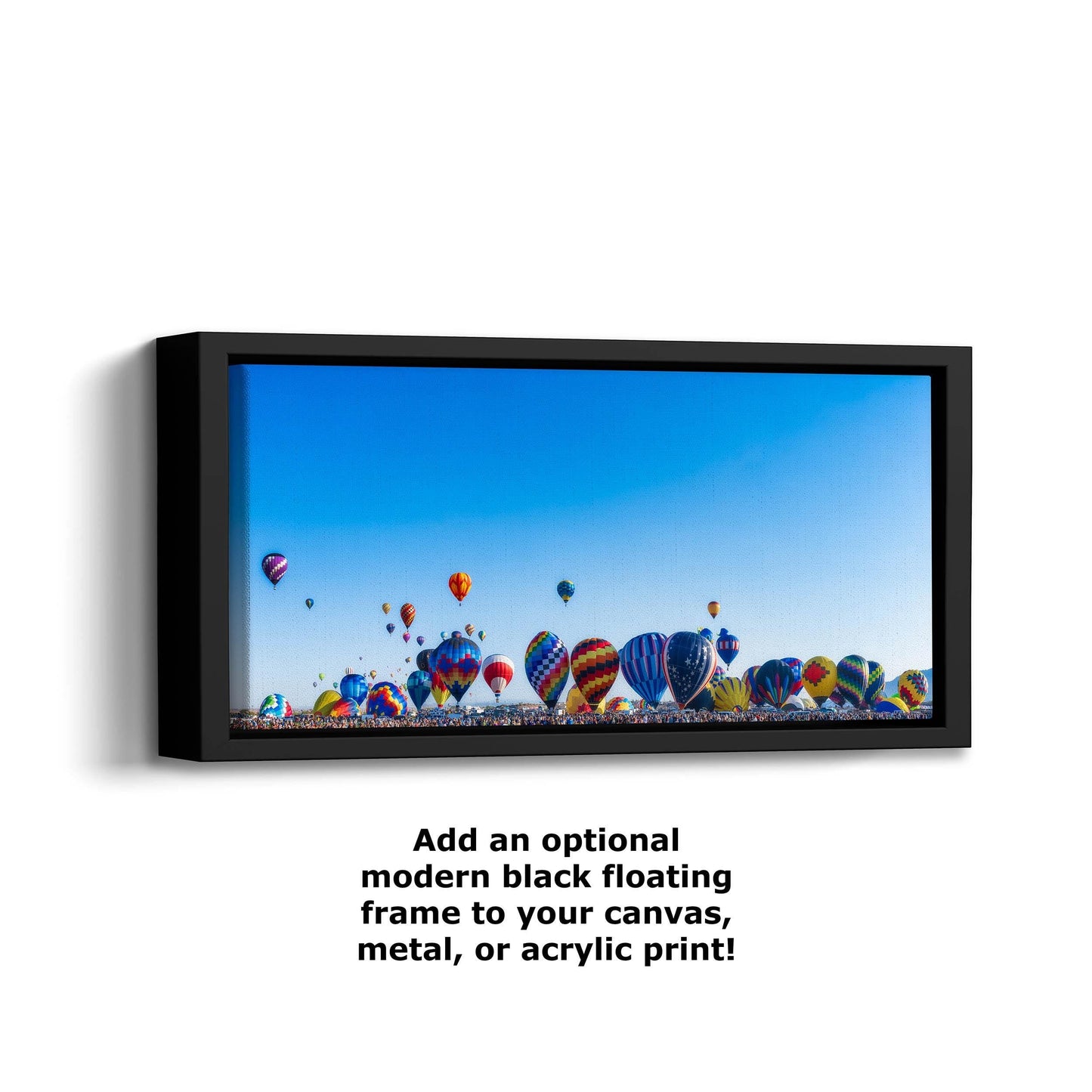 a group of hot air balloons floating in the sky