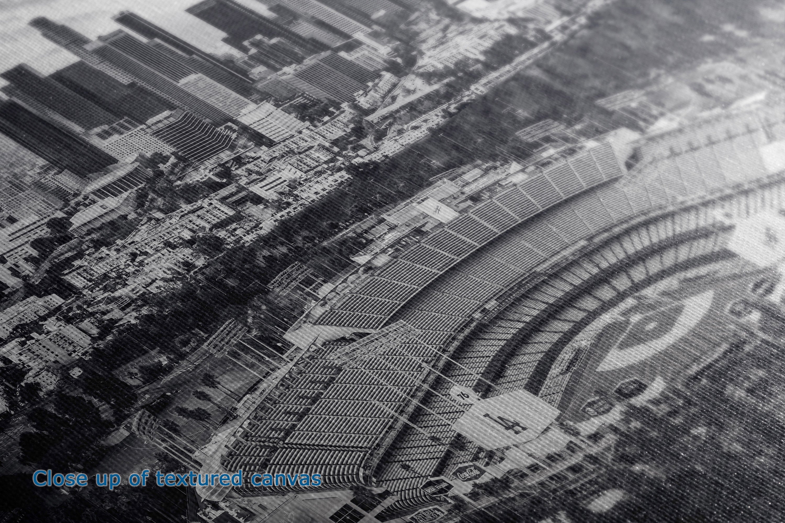 Black and white aerial photograph print of a stadium and surrounding urban area, with a small blue text overlay reading 'Close up of stadium close-up' in the lower-left corner.
