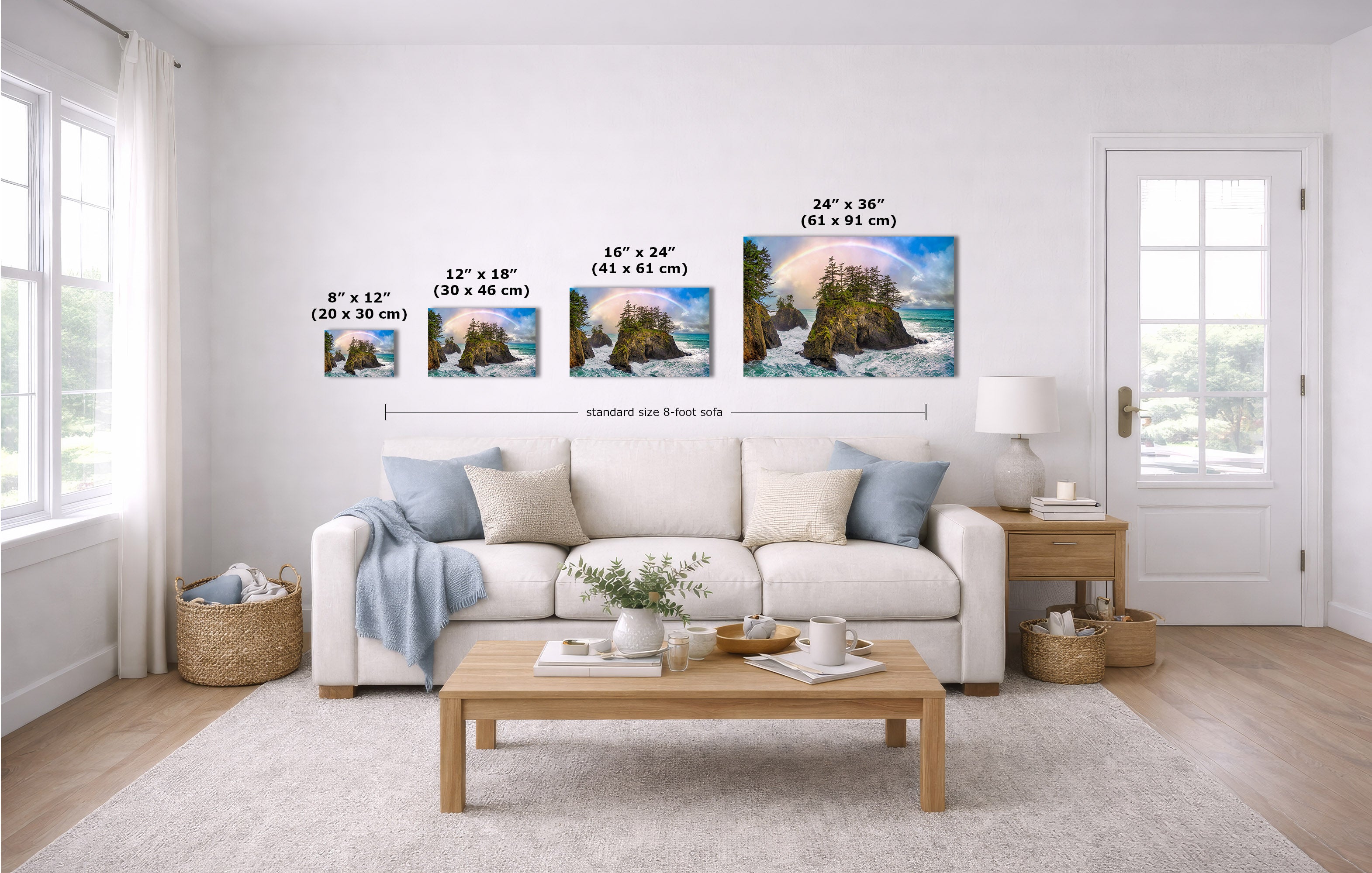 A staged living room shows a set of four coastal landscape wall art prints above a white sofa, with size labels overlaid for each print. Because a real interior environment is present, this is Lifestyle rather than Product/Packaging.
