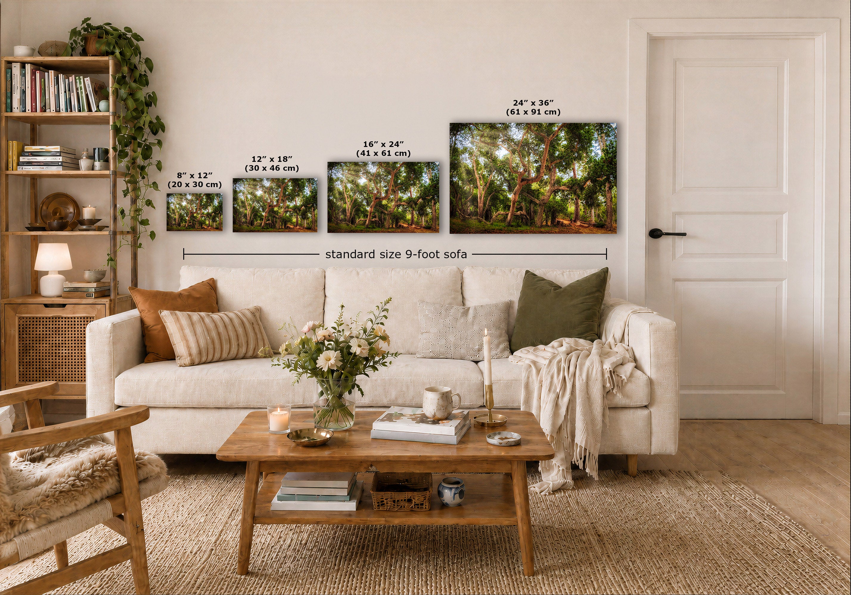 A styled living room showing four framed forest art prints of different sizes mounted on a white wall above a beige sofa. The prints depict lush green and brown woodland scenes, with size labels and a dimension line reading 'standard size 9-foot sofa'.