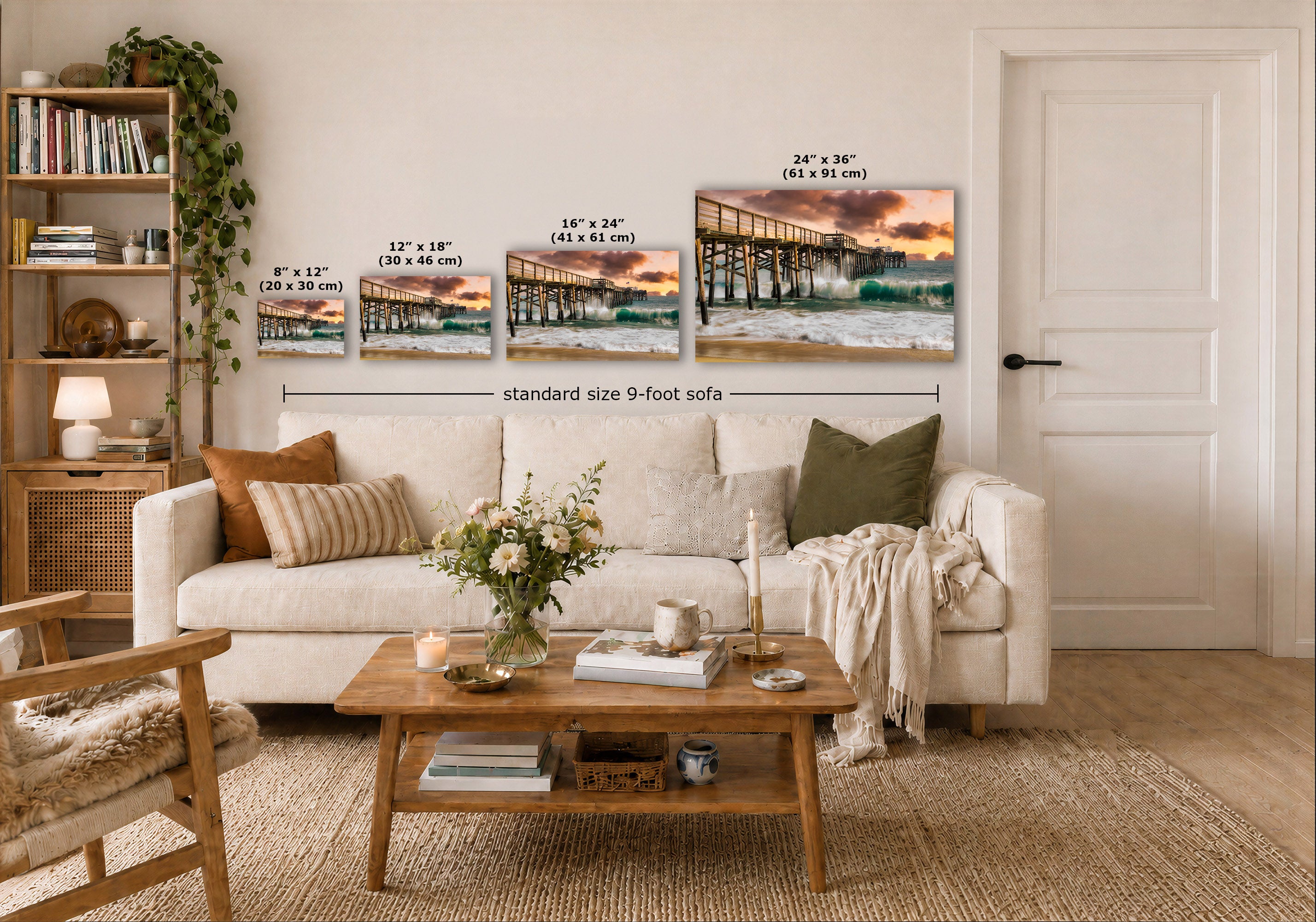 A styled living room showing four wall art prints above a sofa, with overlaid size labels for each print and a dimension line reading 'standard size 9-foot sofa.' Because a real interior environment is clearly present, this fits Lifestyle rather than Product/Packaging, even though the prints are the product focus.