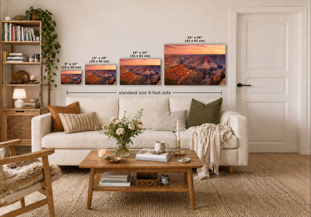 A staged living room shows a set of four landscape wall art prints above a sofa, with size labels overlaid on each print and a dimension line reading 'standard size 9-foot sofa.'