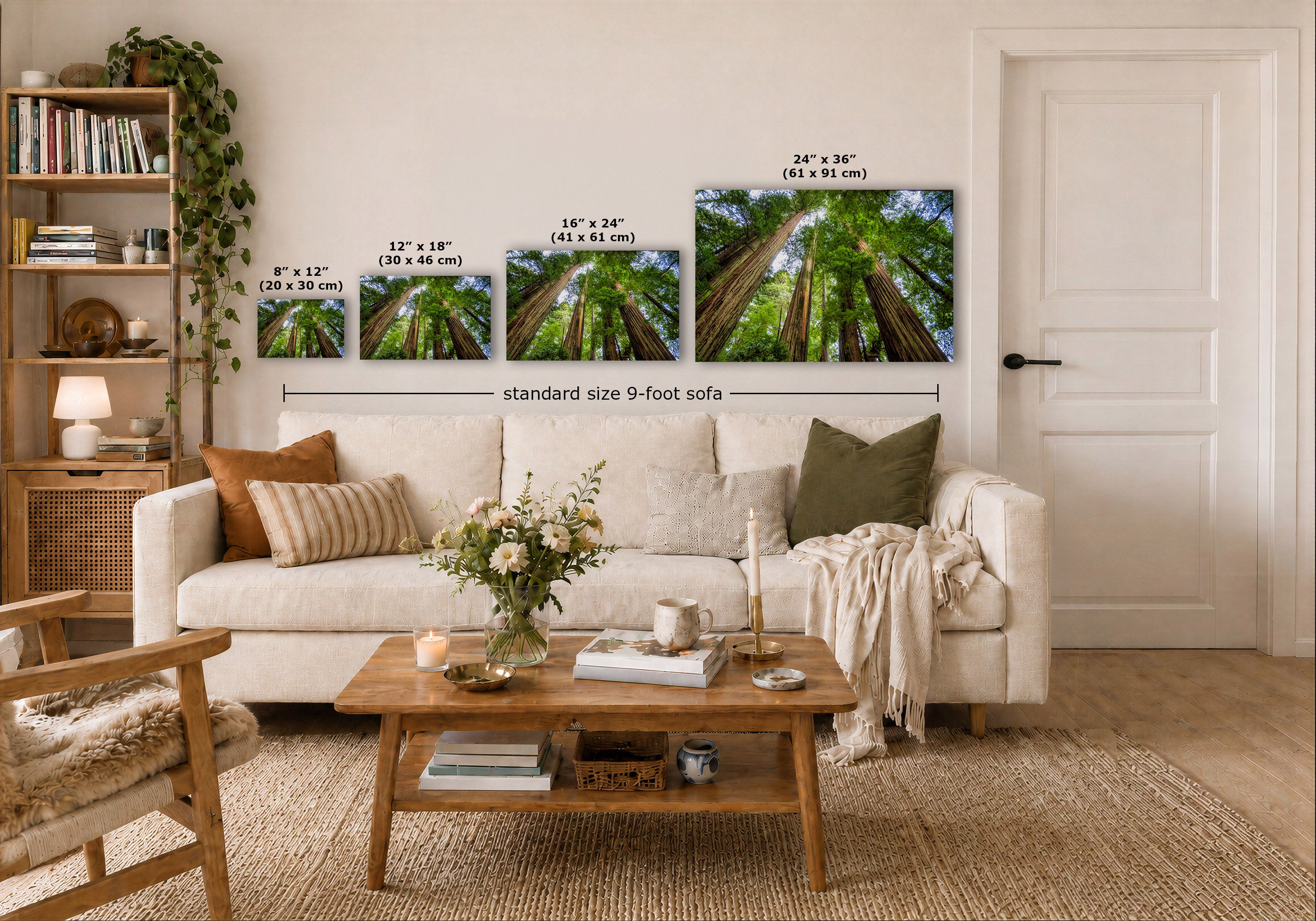 A styled living room showing four forest wall art prints in different sizes mounted above a white sofa. The prints depict tall redwood trees viewed from below, with size labels and a 'standard size 9-foot sofa' measurement annotation overlaid on the scene.
