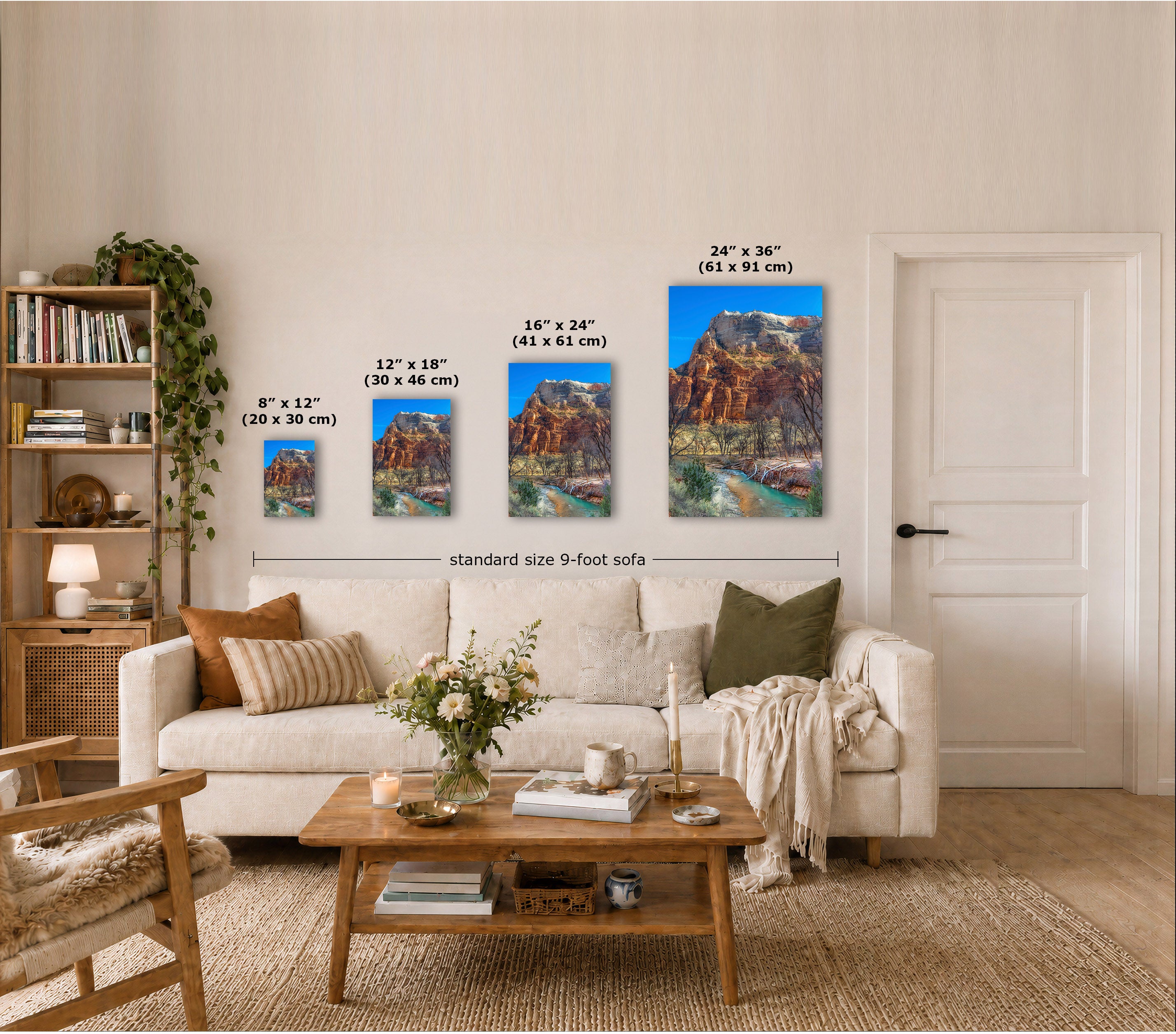 A staged living room showing four framed mountain landscape prints in different sizes mounted above a sofa, with overlaid dimension labels for each print and a sofa width reference below.
