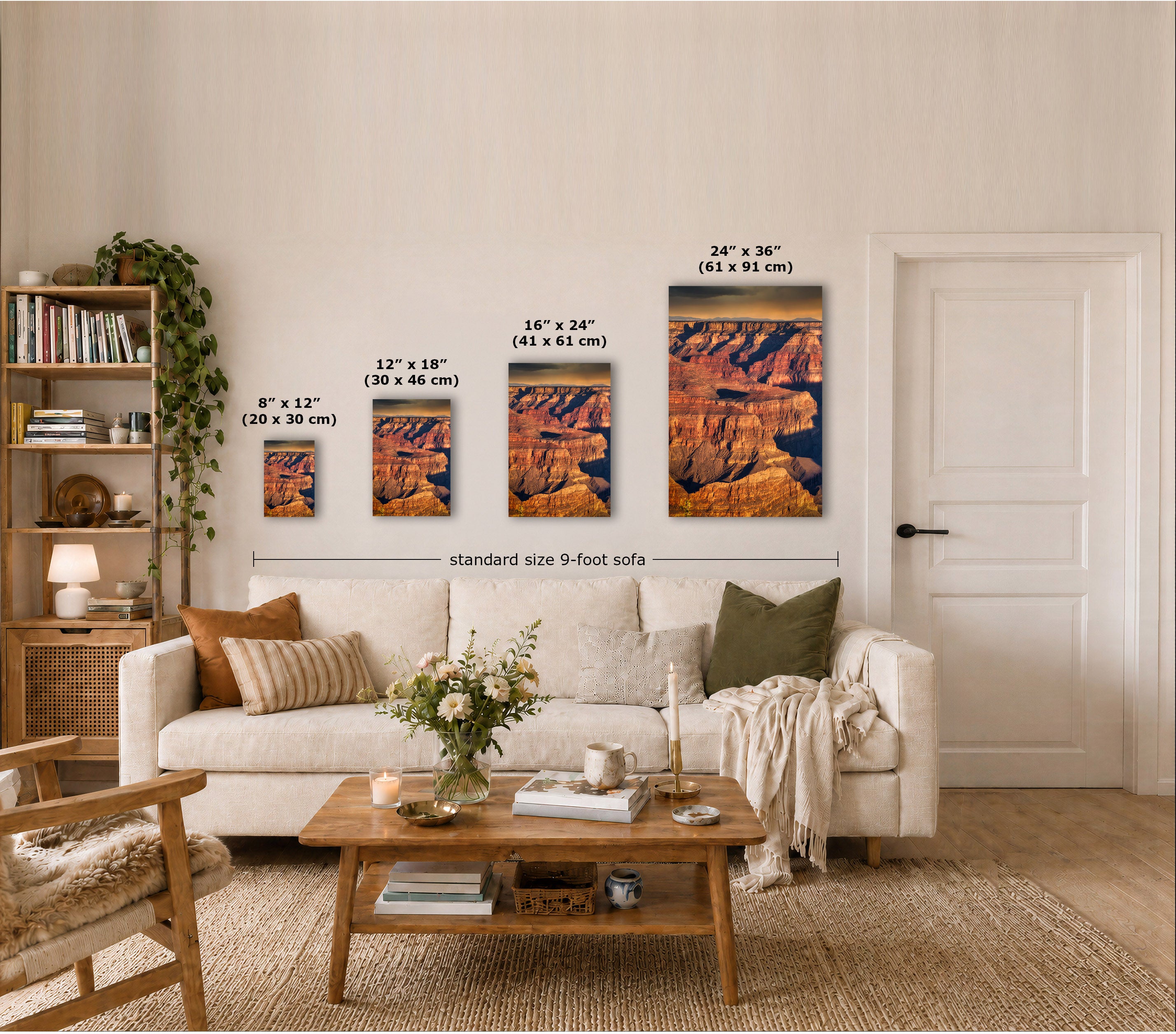 Four framed wall art prints depicting canyon landscapes are displayed above a sofa in a styled living room. Each print shows different dimensions labeled in inches and centimeters, with a dimension line reading 'standard size 9-foot sofa'.