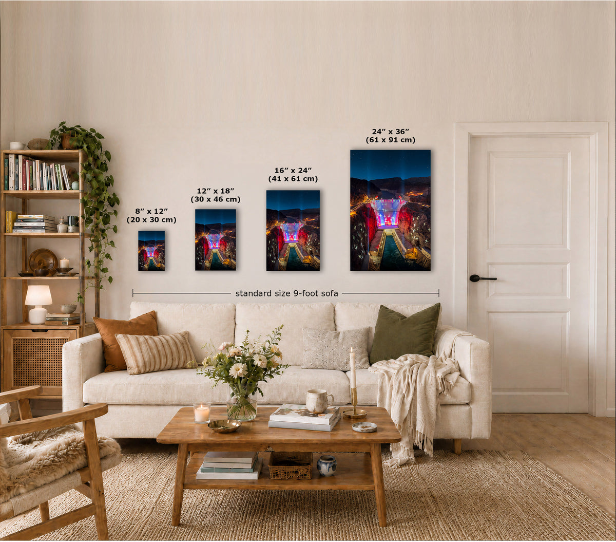 A staged living room shows four vertical wall art prints of Hoover Dam with an American Flag projected across it in different sizes above a sofa, with printed dimensions overlaid on each piece. Because a real interior environment is clearly present, this is Lifestyle rather than Product/Packaging.