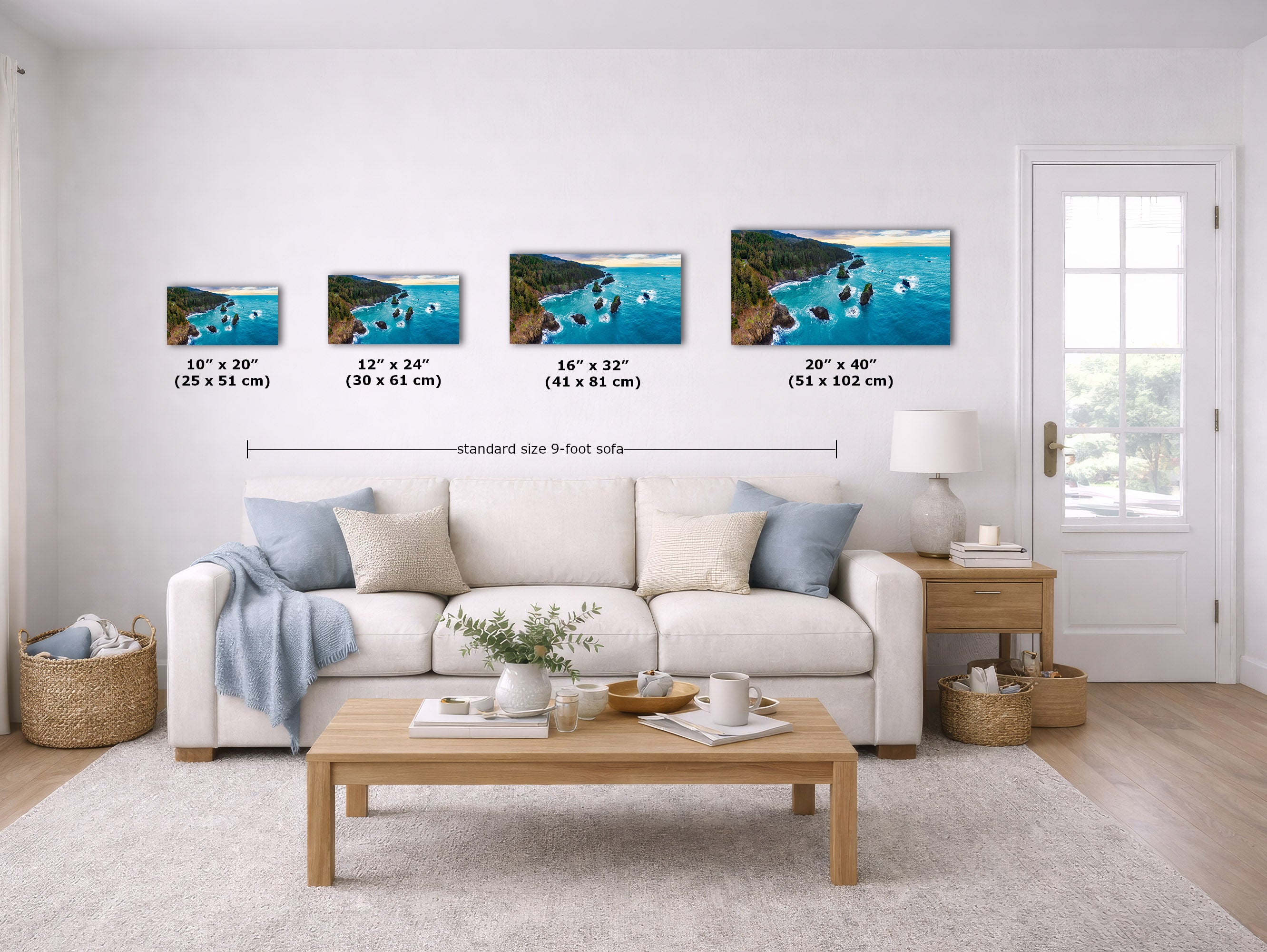 A staged living room shows four framed coastal art prints mounted above a white sofa, with size labels for each print and a note reading standard size 9-foot sofa. Because a real interior environment is present, this is Lifestyle rather than Product/Packaging.