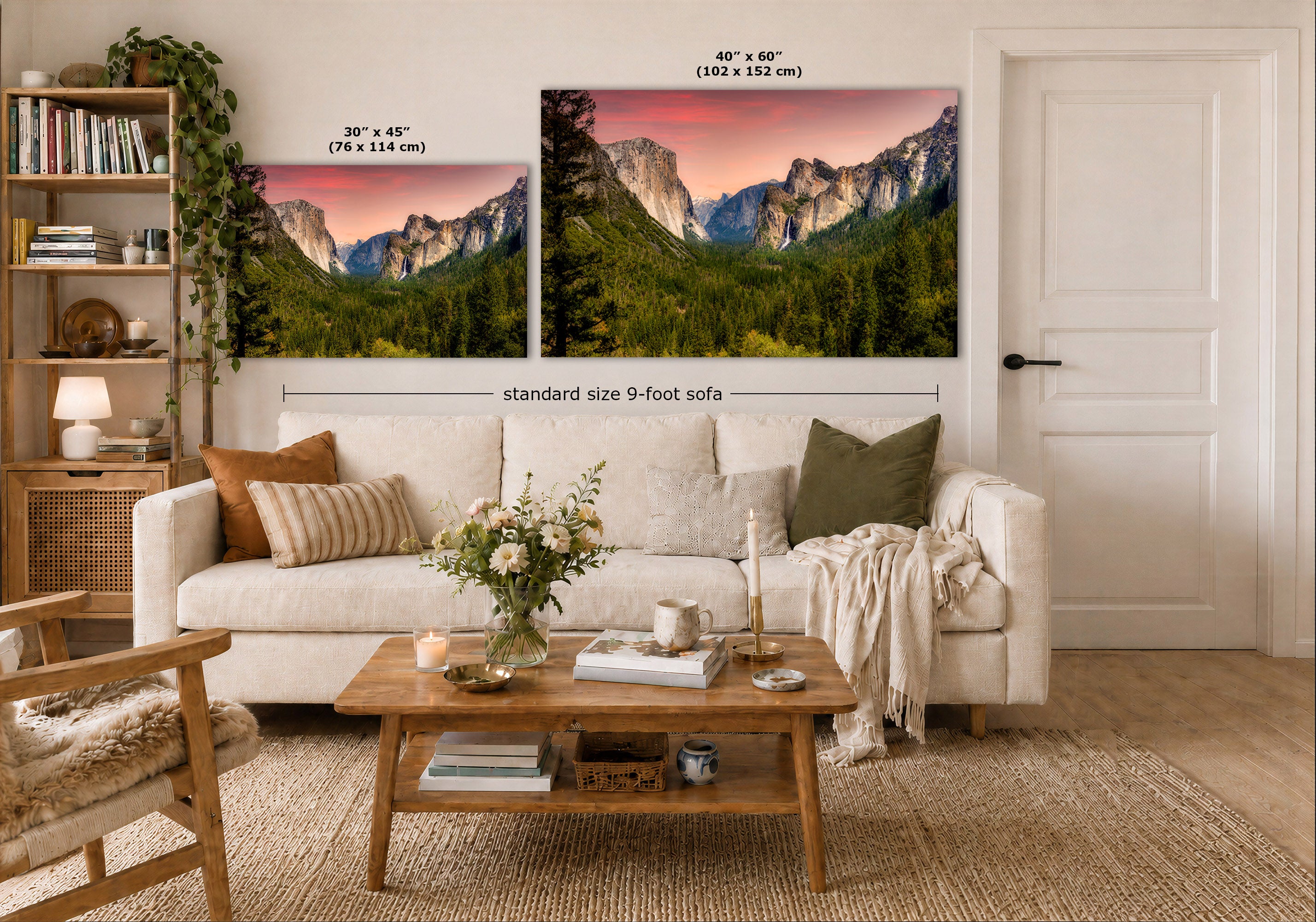 A staged living room shows two mountain landscape wall art prints above a white sofa. The left print is labeled 30 x 45 inches, and the larger right print is labeled 40 x 60 inches, with a note reading standard size 9-foot sofa.
