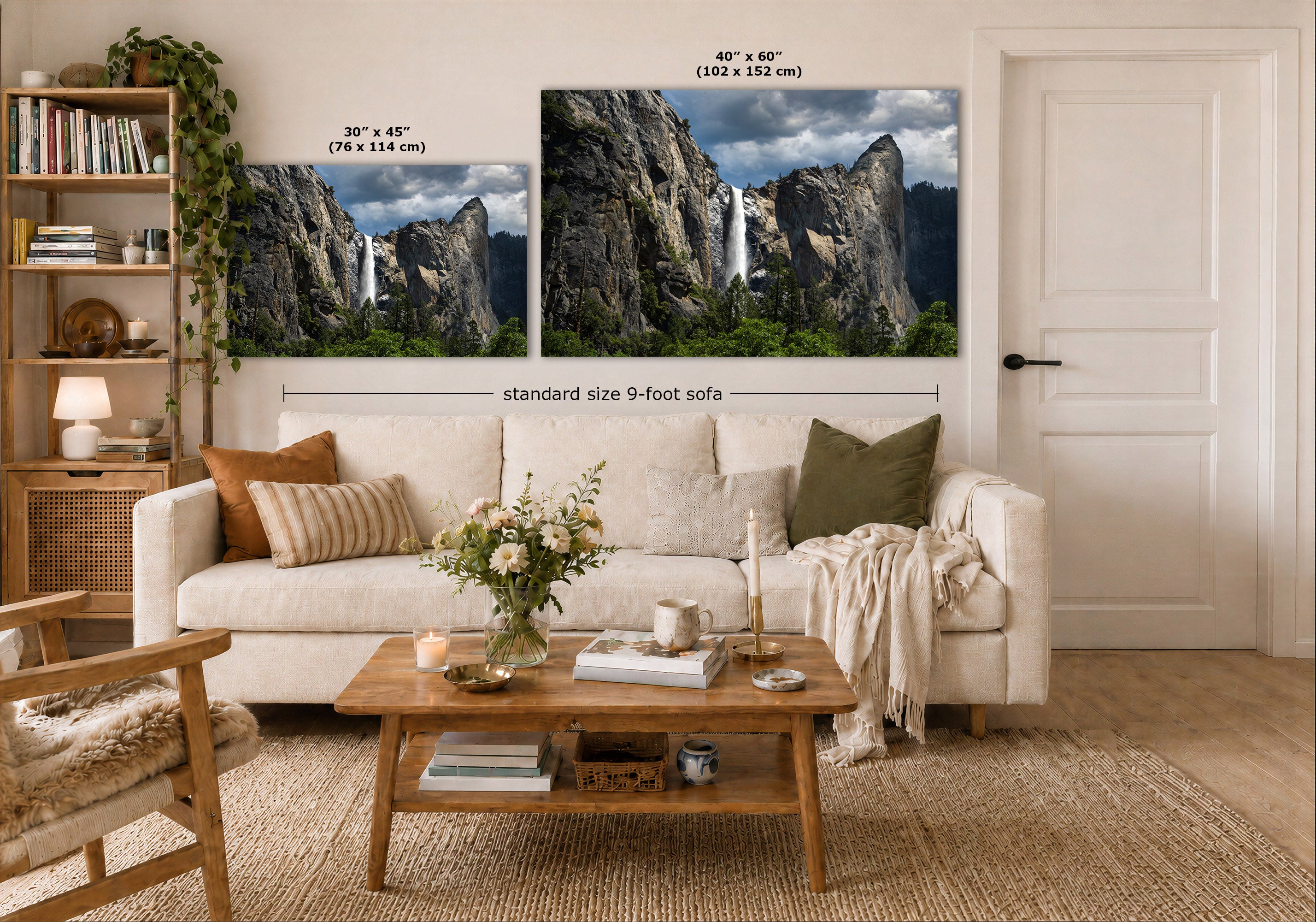 A styled living room showing two framed wall art prints above a white sofa. The prints depict a dramatic mountain landscape with waterfalls, and the image includes dimension labels for the two sizes: 30 x 45 inches and 40 x 60 inches, plus a note for a standard size 9-foot sofa.