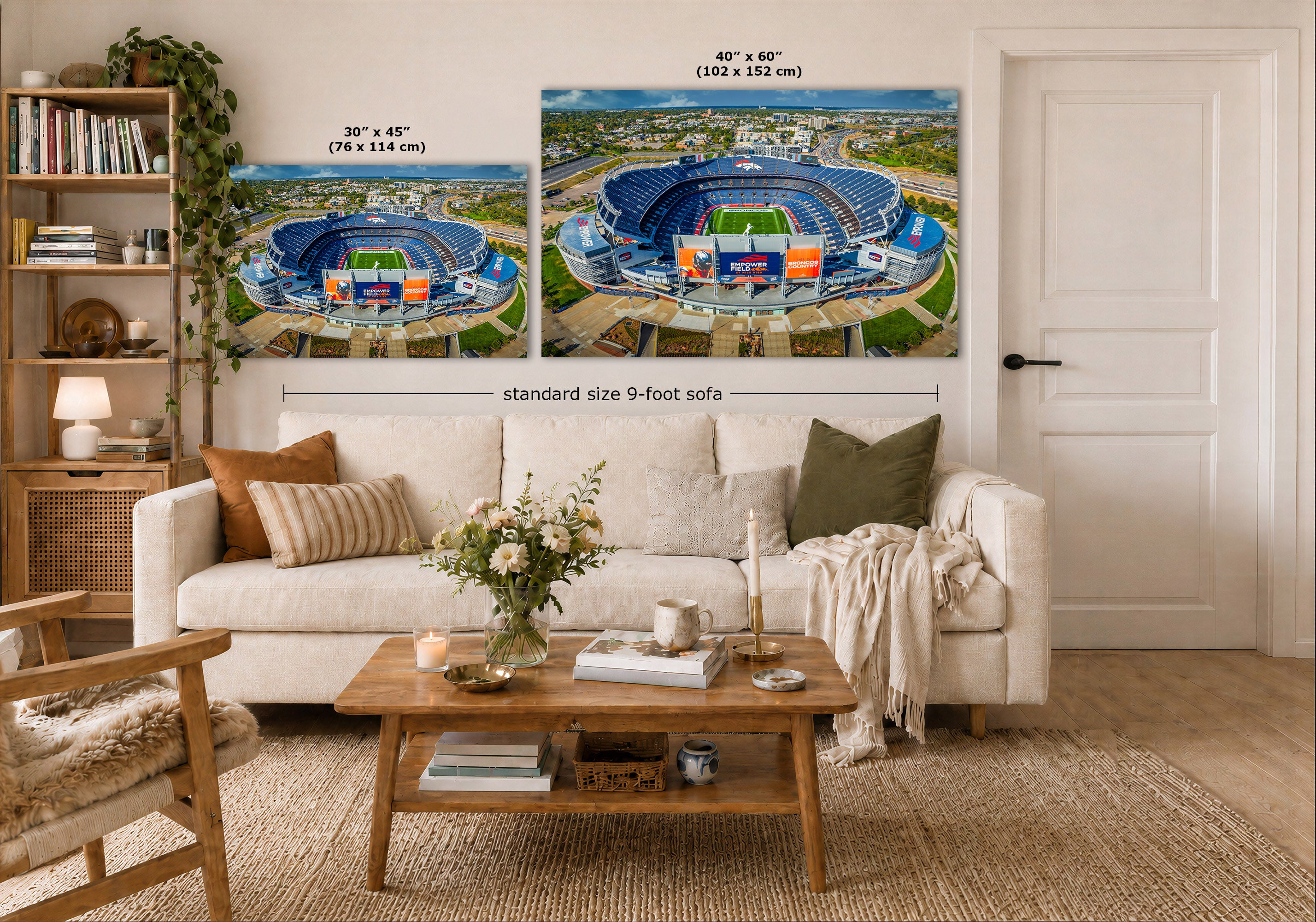Two wall art prints showing blue stadium interiors are displayed above a white sofa in a styled living room. The left print is labeled 30 x 45 inches, and the right print is labeled 40 x 60 inches, with a note reading standard size 9-foot sofa.