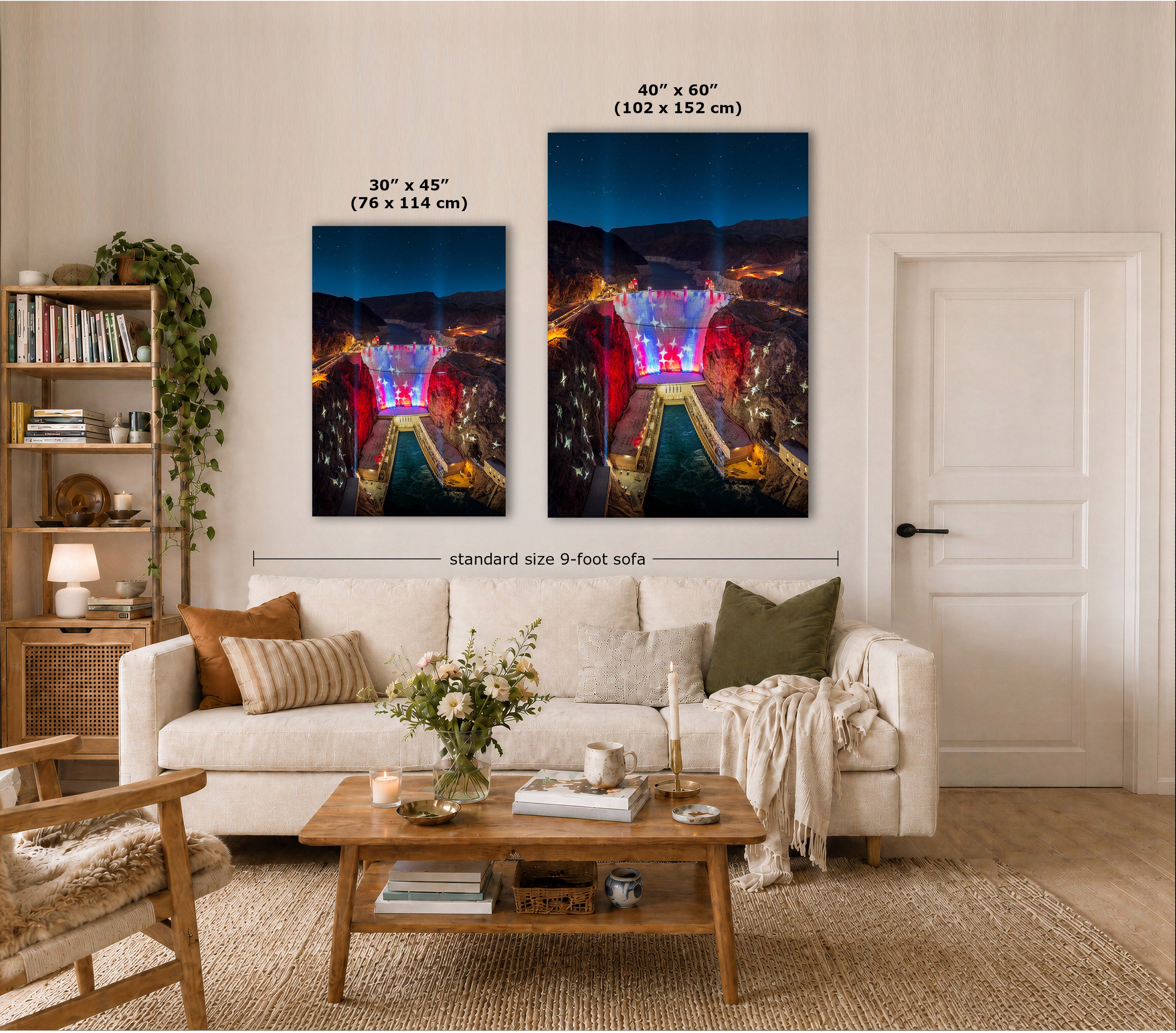 Two vertical canvas wall art prints showing a colorful night cityscape over a river, displayed above a white sofa in a styled living room. Text labels indicate the sizes 30 x 45 inches and 48 x 60 inches, with a dimension line noting standard size 9-foot sofa spacing.