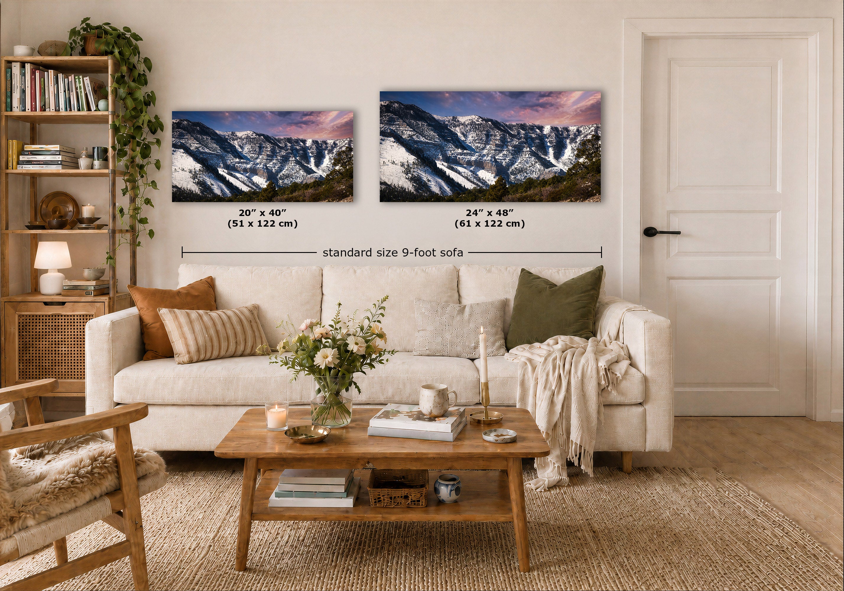 Two framed mountain landscape prints displayed above a white sofa in a styled living room. The prints show snowy peaks under a pink and purple sky, with size labels reading 20 x 40 inches and 24 x 48 inches, plus a dimension line across the pair.