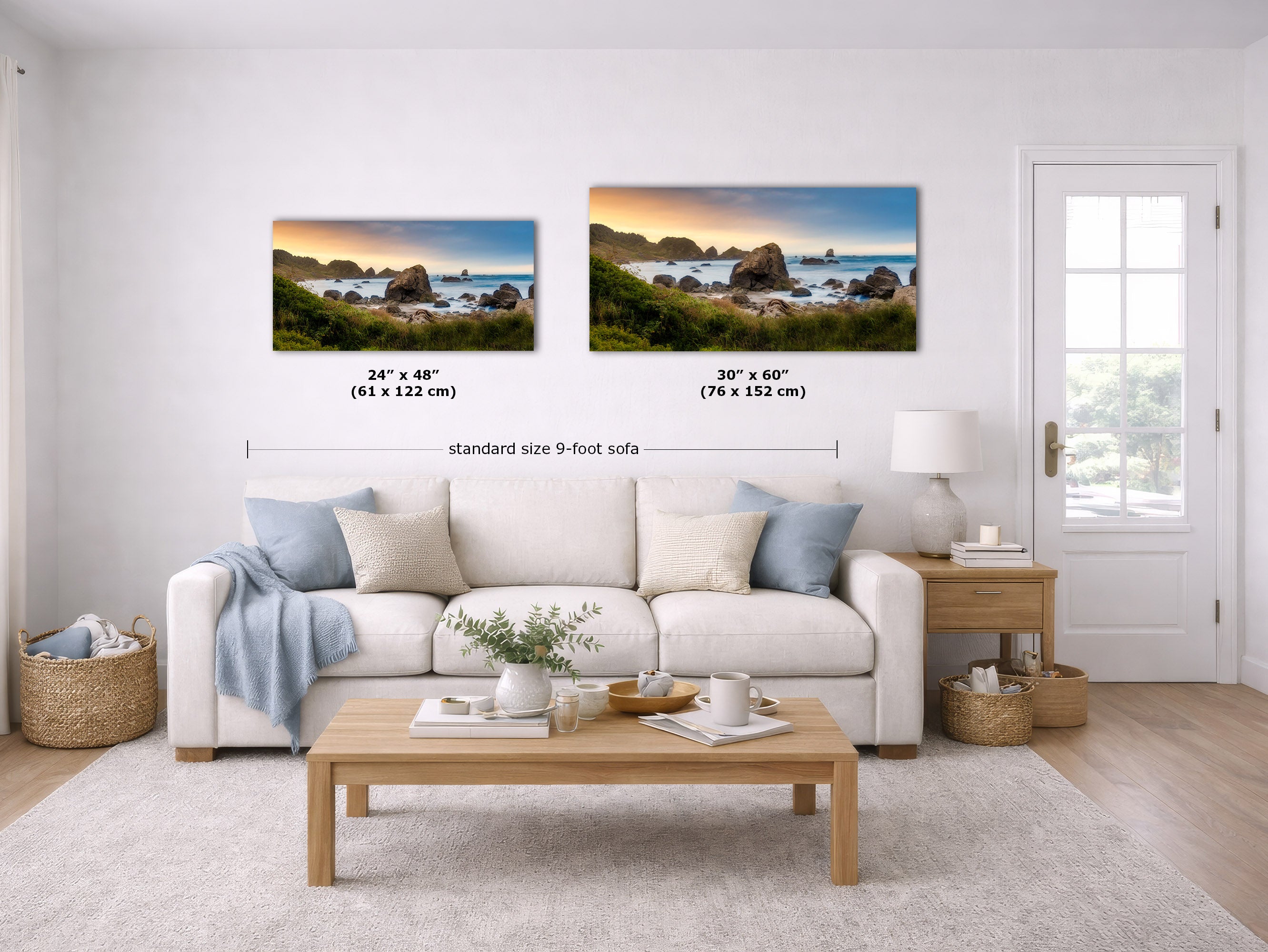 A staged living room shows two coastal landscape wall art prints above a white sofa. The left print is labeled 24 x 48 inches, and the right print is labeled 30 x 60 inches, with a dimension line across both reading standard size 9-foot sofa.