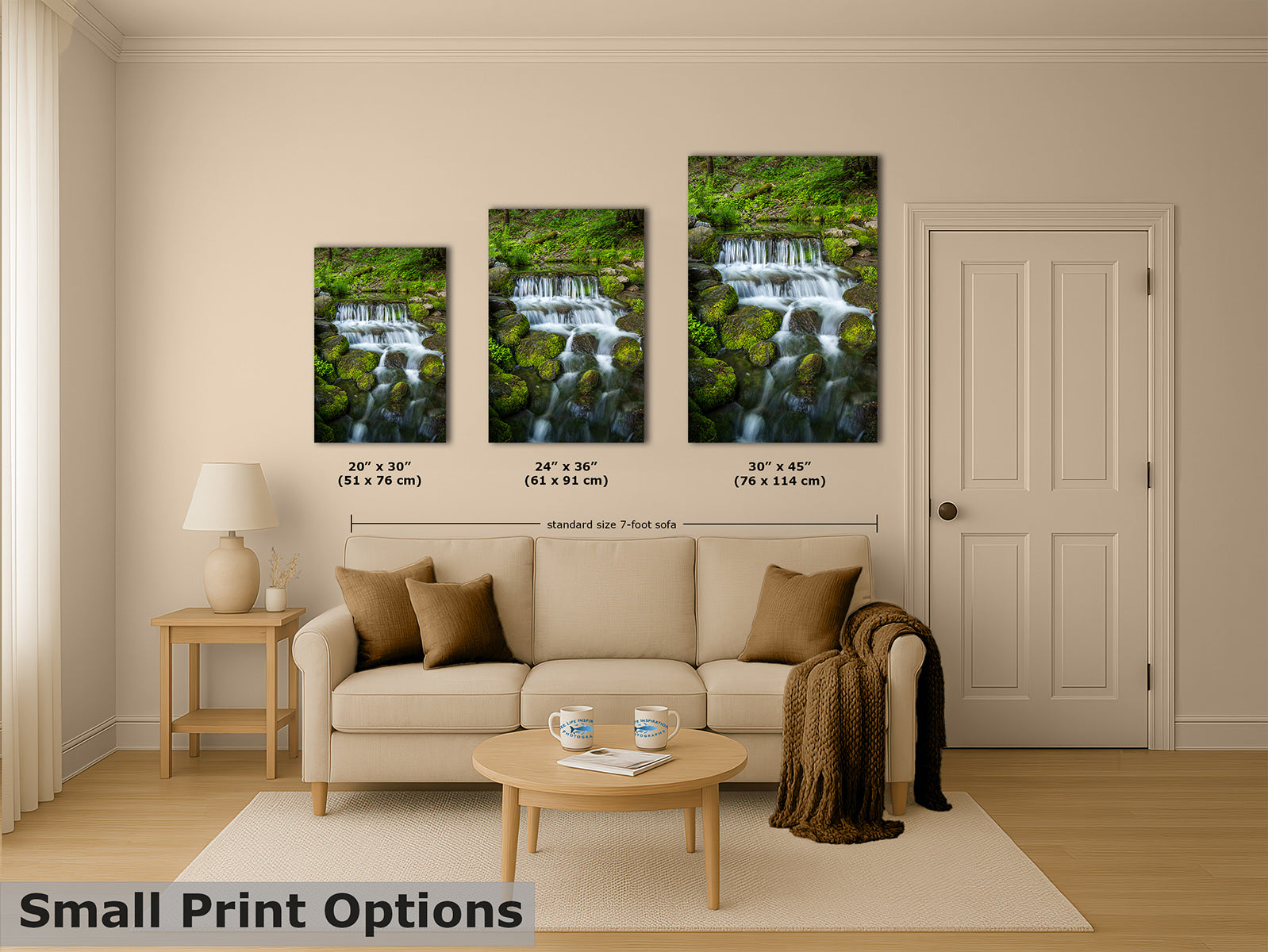 Three vertical fine art prints showing a waterfall over mossy rocks, displayed on a beige wall above a cream sofa in a styled living room. Measurement labels for the canvases are overlaid, and a text banner at the bottom reads 'Small Print Options'.