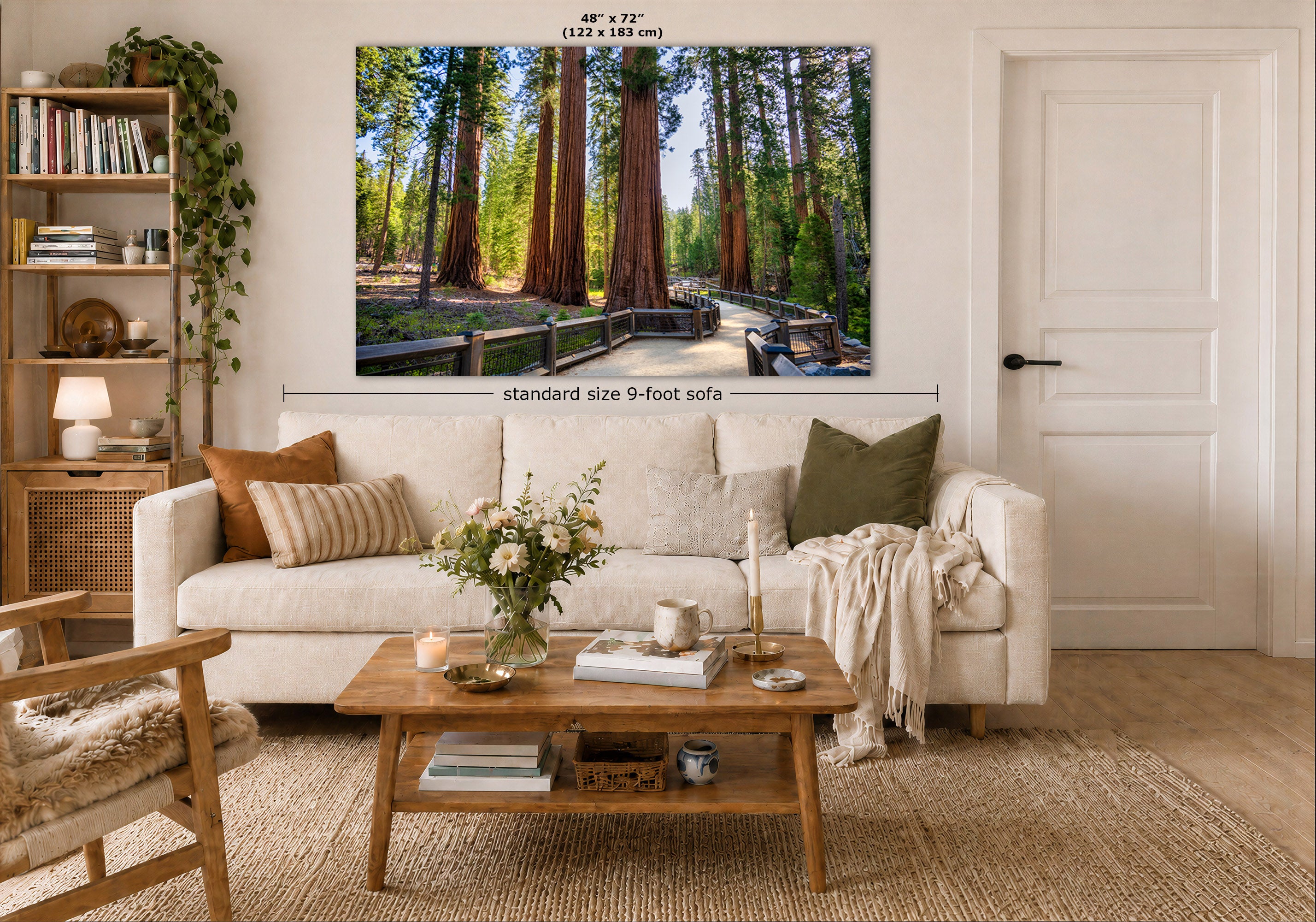 A Giant Sequoia Grove wall art print showing a forest path with tall redwood trees, displayed above a white sofa in a styled living room. Measurement labels indicate the print is 48 x 72 inches, and the sofa is labeled as standard size 9-foot sofa.