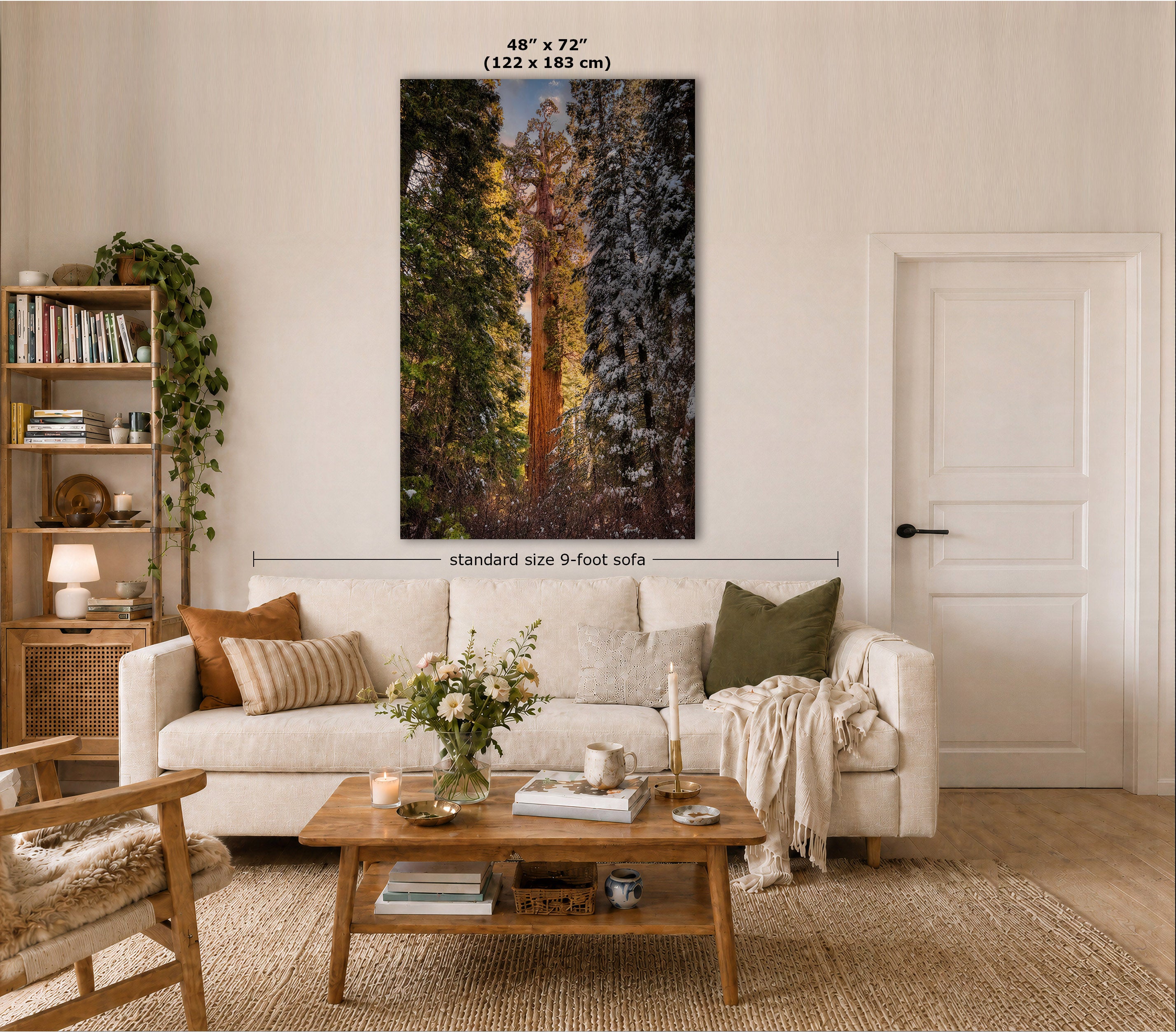 A large vertical wall art print showing a forest scene with tall trees in autumn colors, displayed above a white sofa in a styled living room. Text on the image indicates the print size as 48" x 72" (122 x 183 cm) and notes standard size 9-foot sofa spacing.