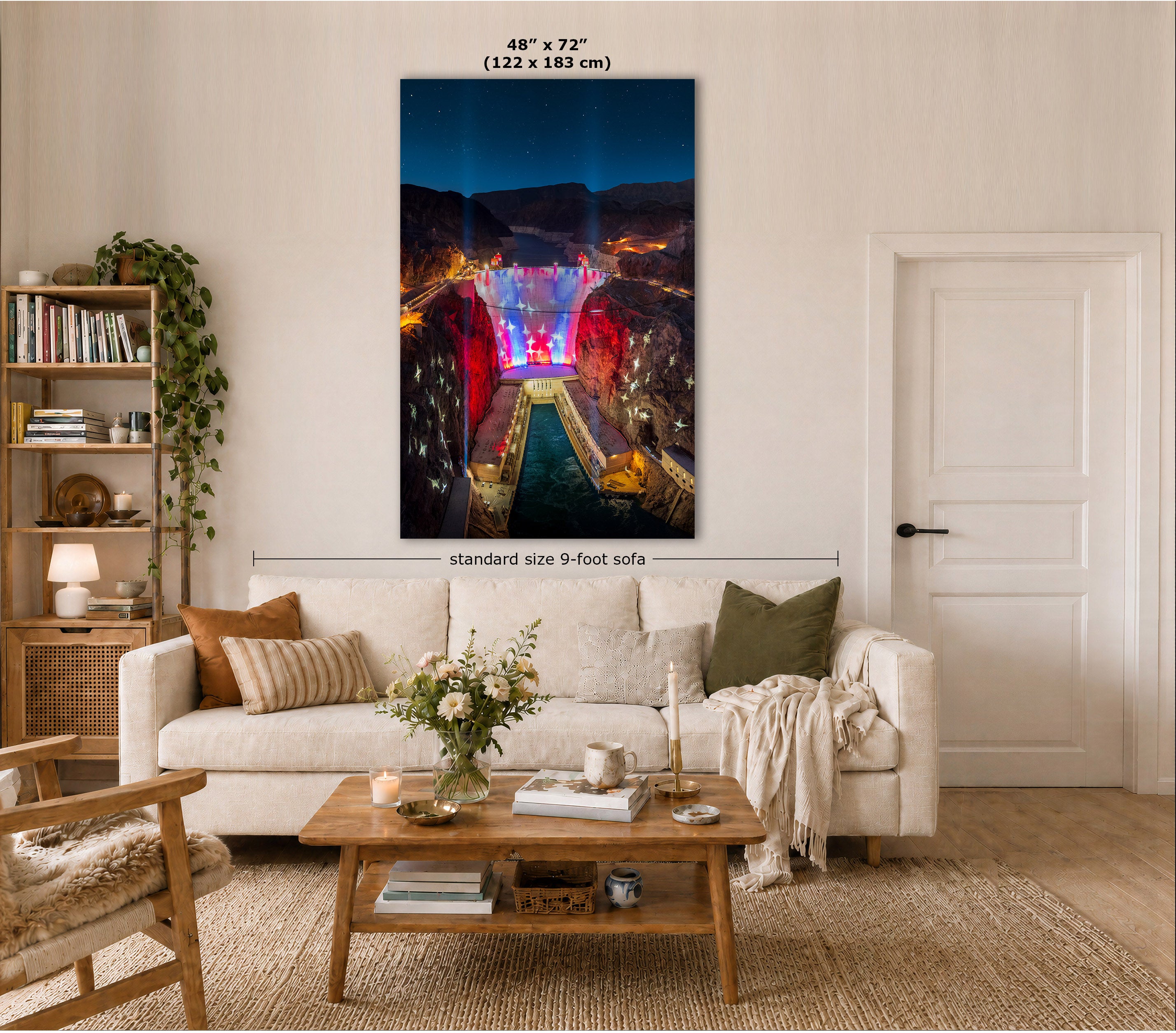 A large vertical wall art print showing a colorful night canyon scene with a glowing bridge, displayed above a white sofa in a styled living room. Text on the image indicates the print size as 48" x 72" (122 x 183 cm) and notes standard size 9-foot sofa.