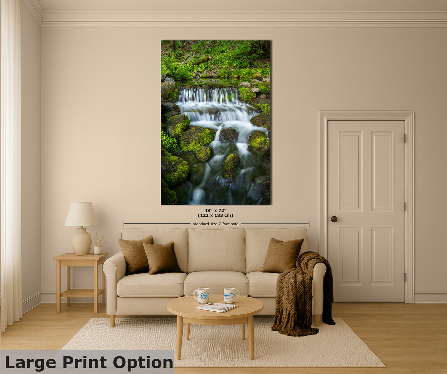 A large vertical wall art print showing a lush green forest stream with a small waterfall, displayed above a beige sofa in a styled living room. The print includes size text indicating 48" x 72" (122 x 183 cm) and a 'Large Print Option' banner at the bottom left.