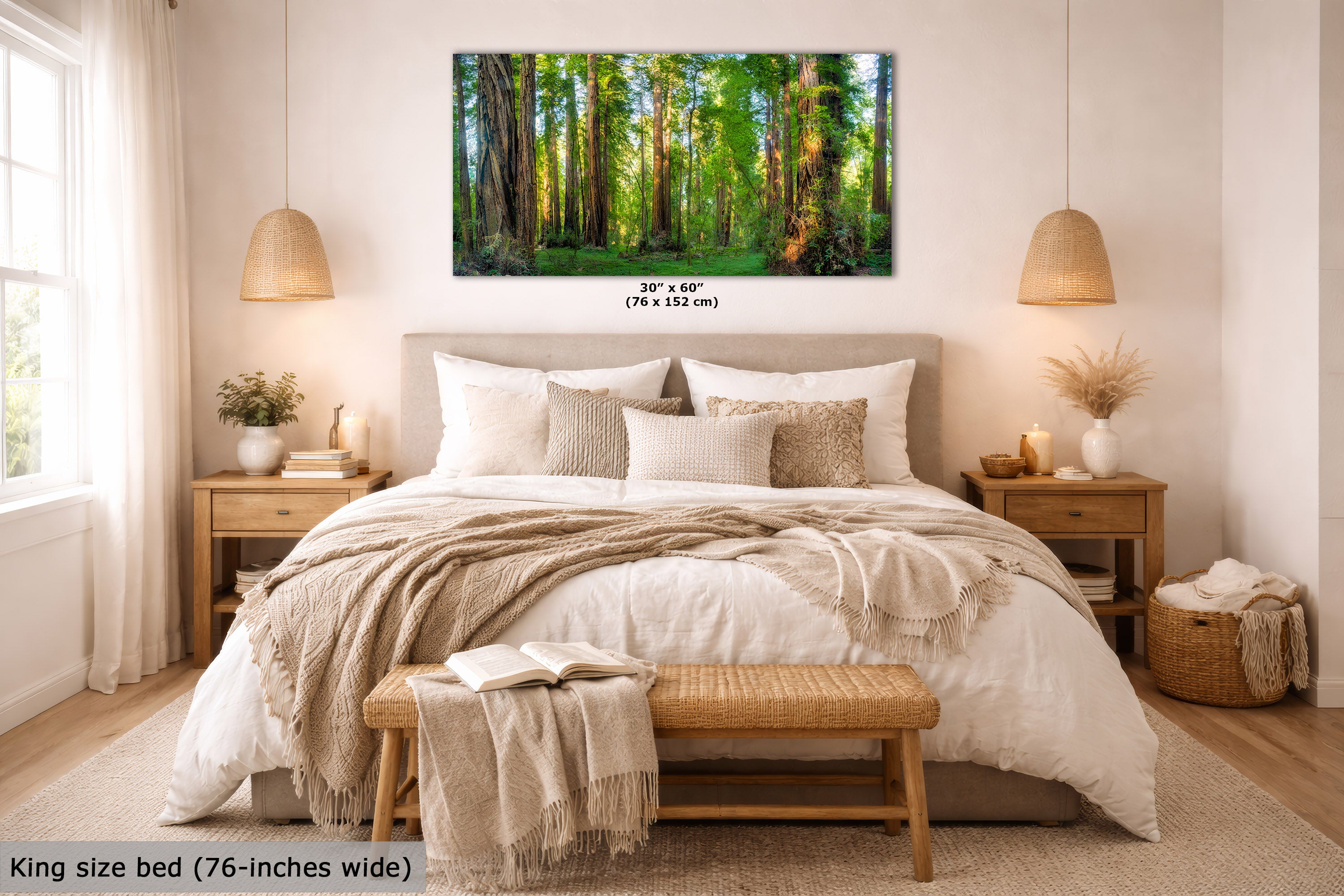 A sunlit redwood grove artwork displayed above a neatly made bed in a bright, modern bedroom. The print shows a lush green woodland scene with tall trees and sunlight.