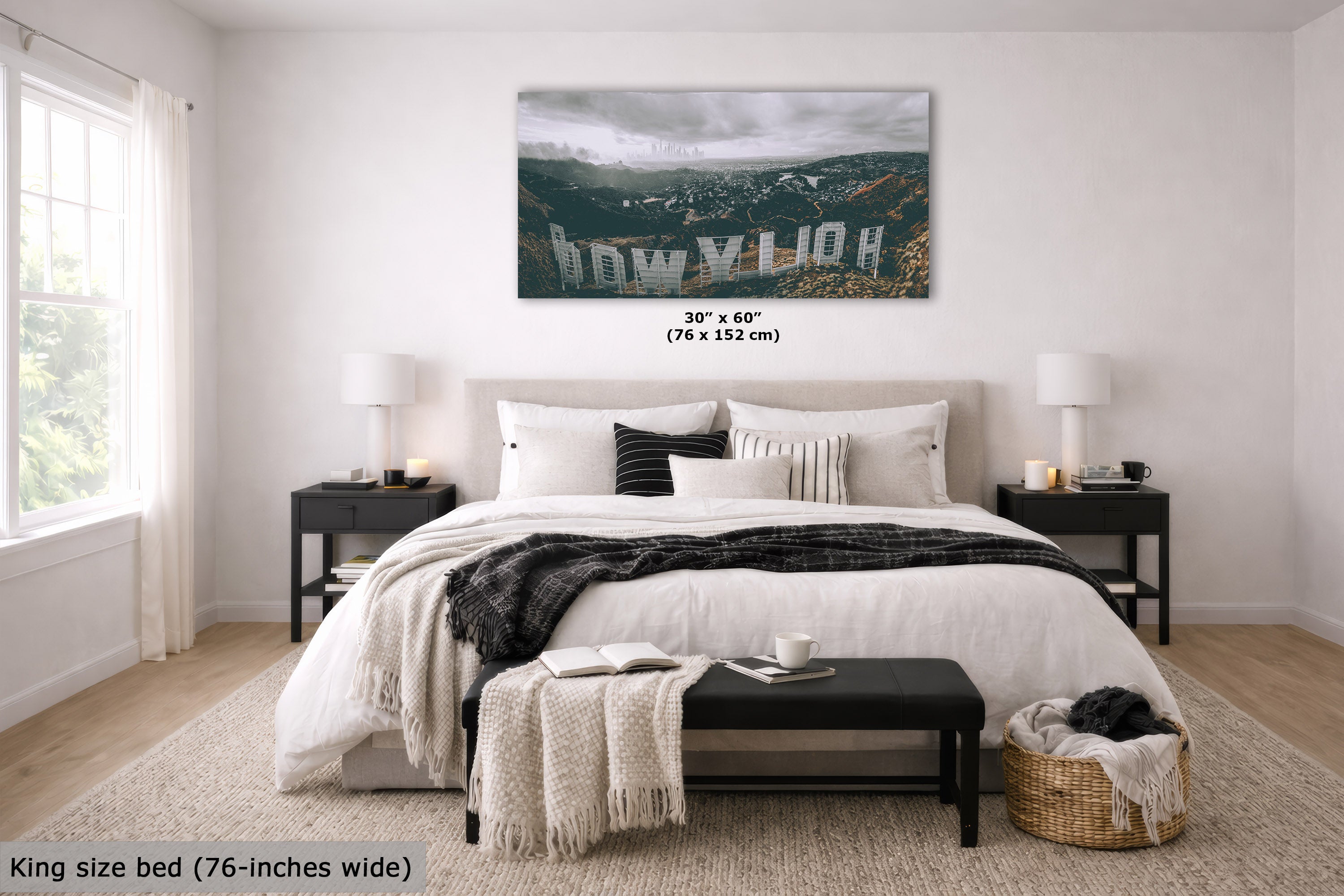 A wall art print showing the Hollywood sign over a mountain landscape, displayed above a king-size bed in a styled bedroom. The print includes size text reading 30 x 60 inches (76 x 152 cm).