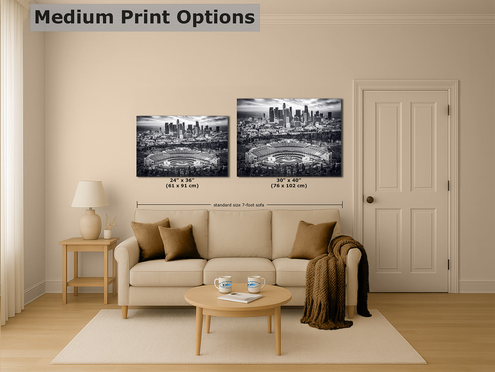 Medium print sizes of monochrome Dodger Stadium and Los Angeles skyline baseball wall art, 24x36 and 30x40 inches above a sofa