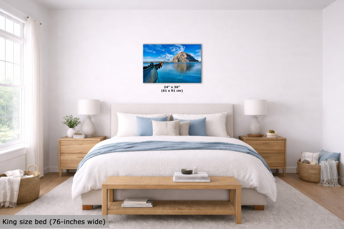 Bedroom with a King size bed, wooden nightstands, and a wall art print.