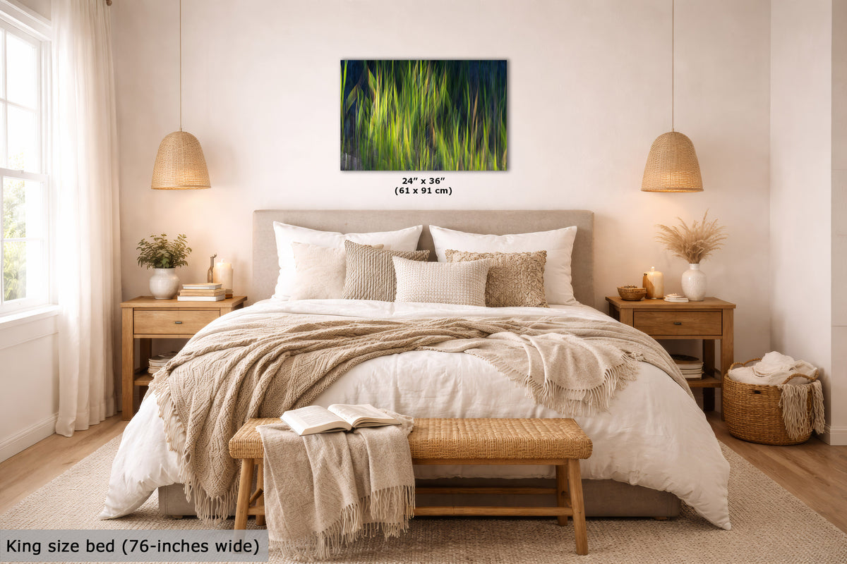 Bedroom with a king-size bed, nightstands, and a wall art of green and yellow grasses as sunset.