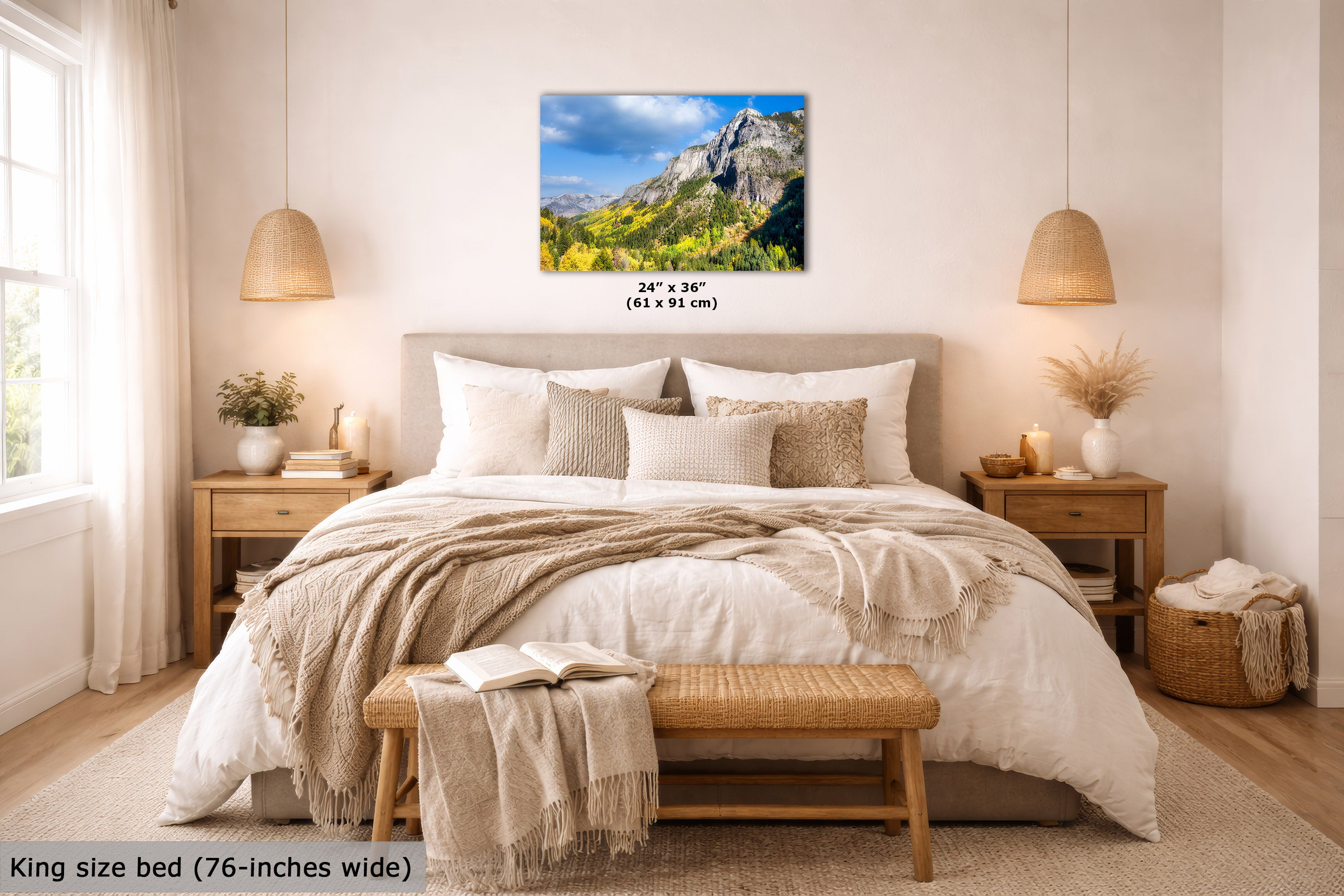 Bedroom with a king size bed and a scenic wall art print.