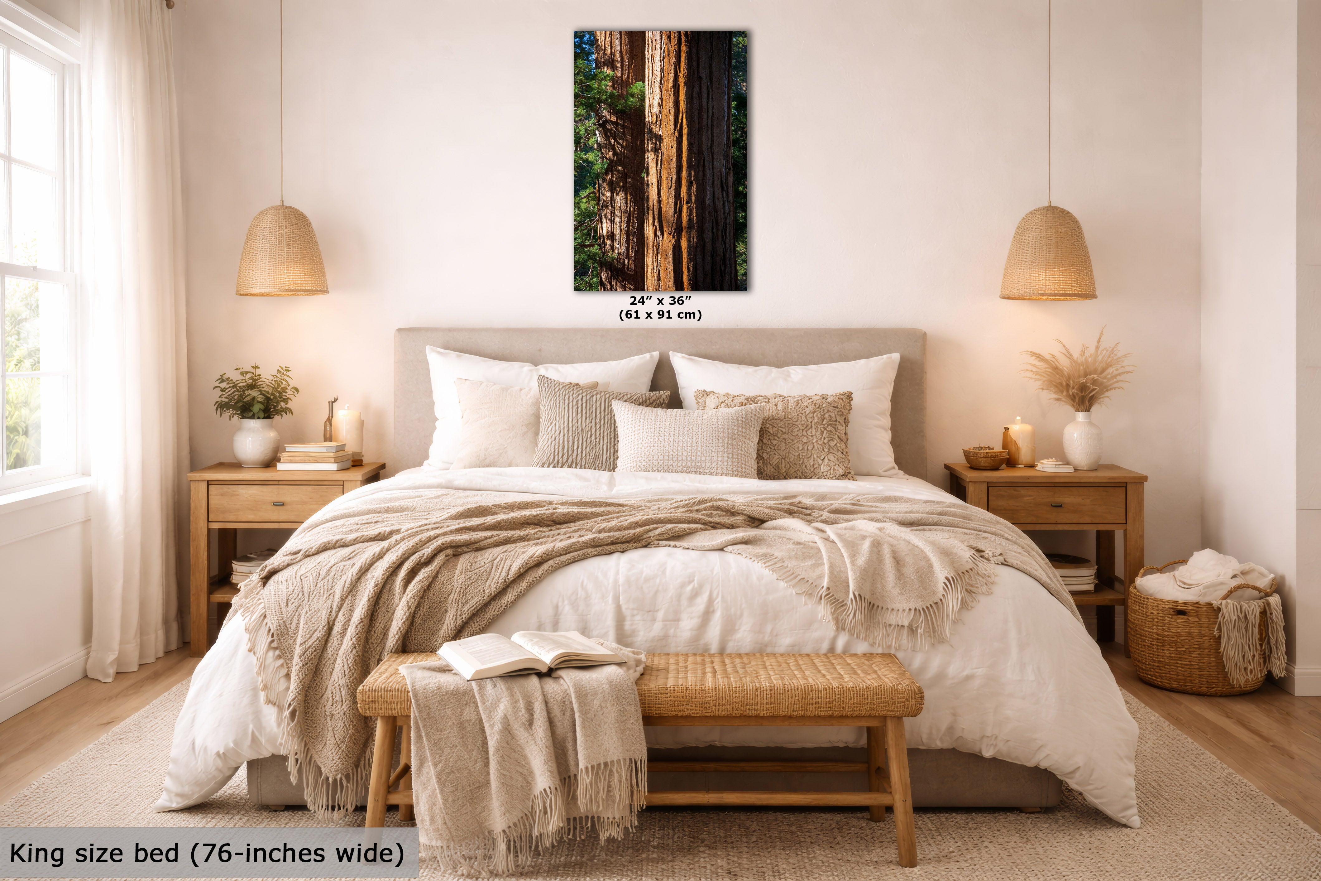 Neatly made bed in a bedroom with a king size bed, wooden bench, and decorative items.