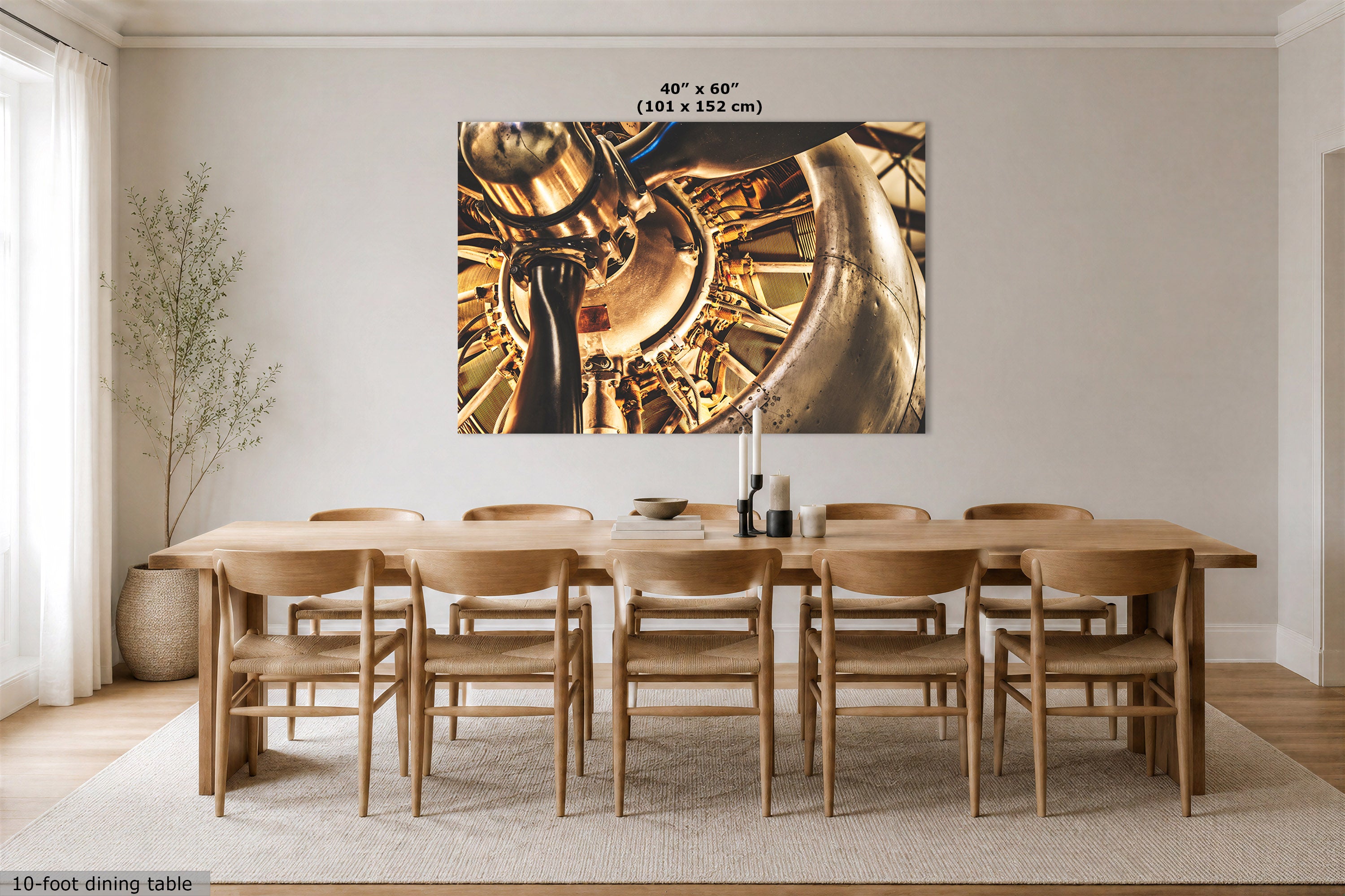 A large wall art print displayed above a wooden dining table and chairs in a bright dining room. Text at the top of the print reads 40" x 60" (101 x 152 cm).