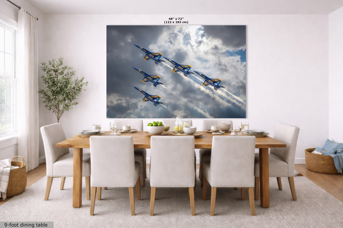 A large wall mural depicting the Blue Angels flying in formation against a cloudy sky, shown hanging on a dining room wall above a wooden dining table and chairs.