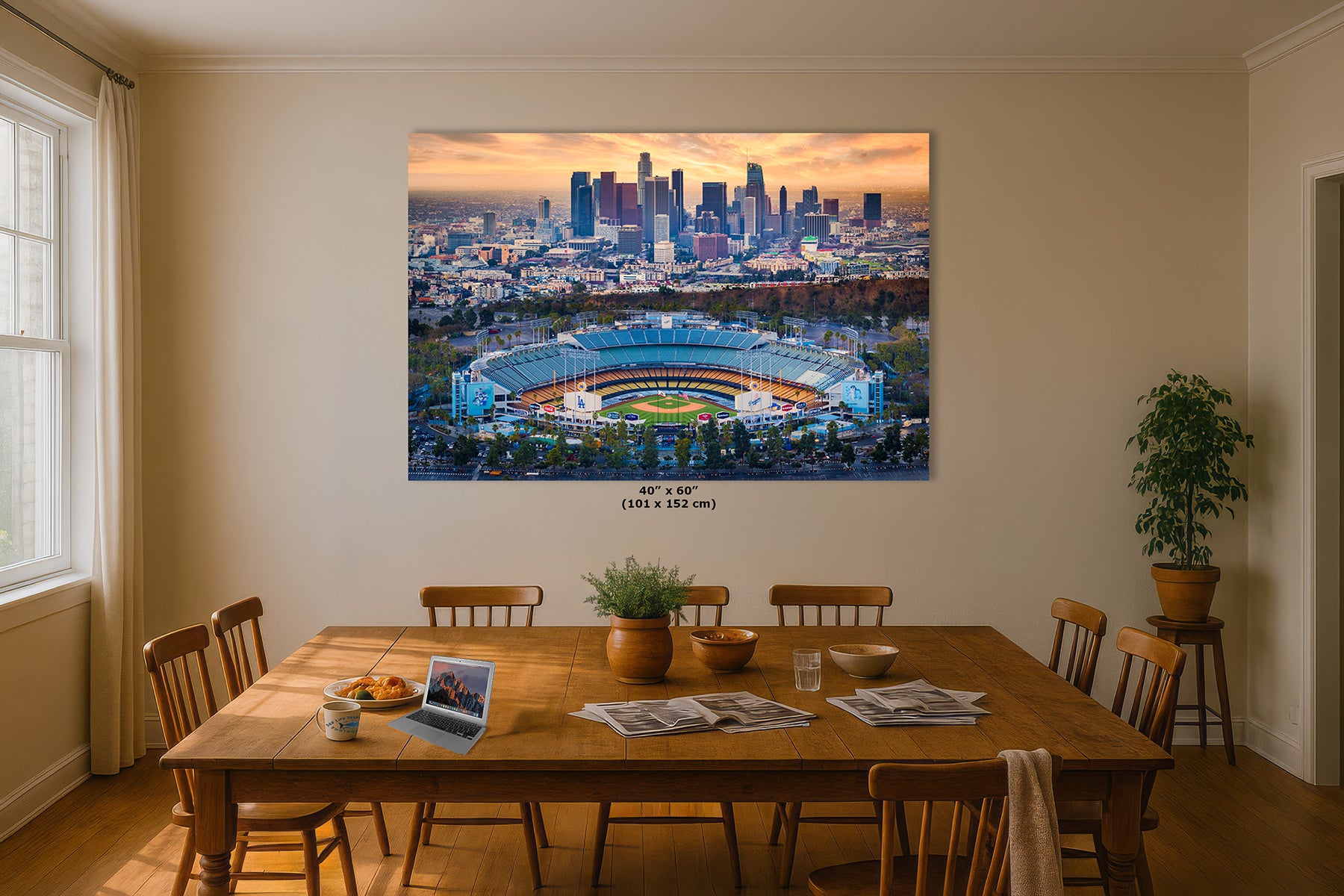 40x60 inch print of Dodger Stadium and the Los Angeles skyline above a wooden dining table, baseball wall art